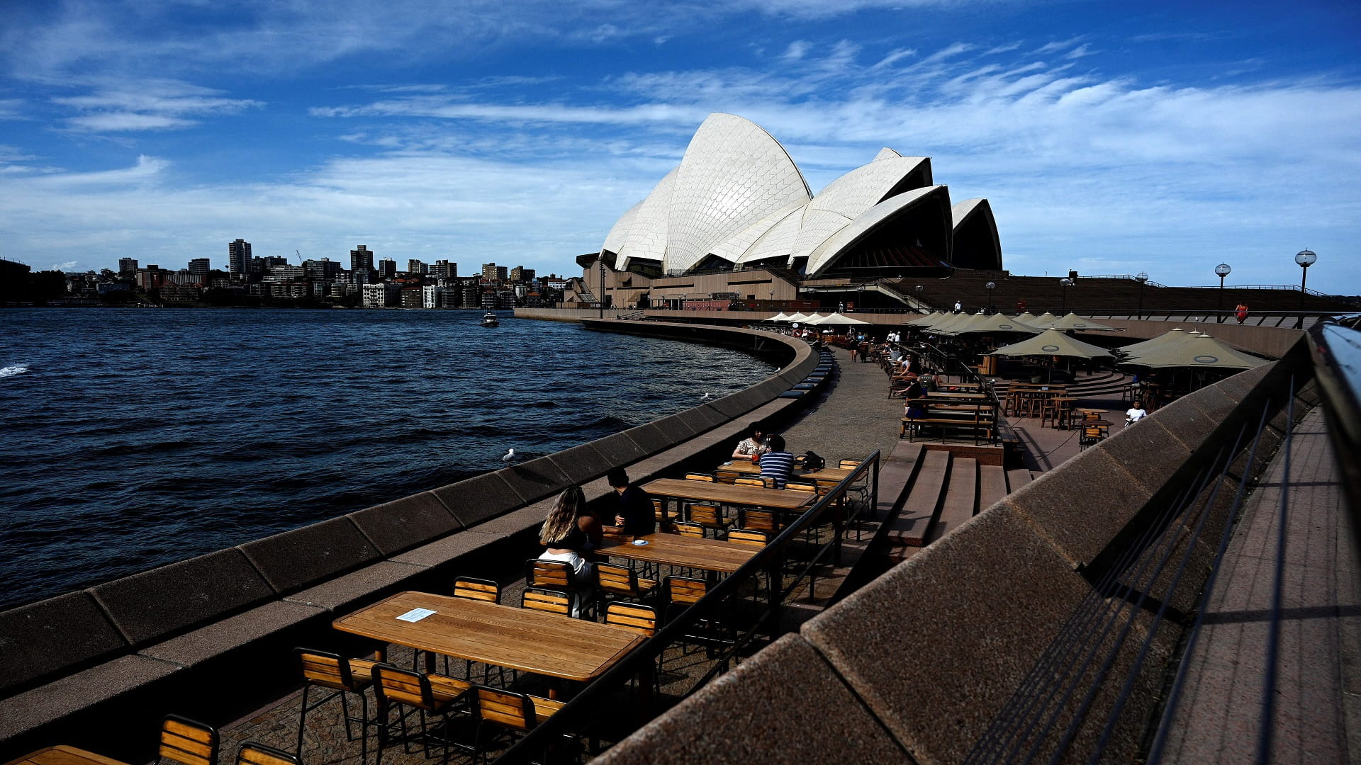 Image for the title: Australia sees COVID-19 cases climb 