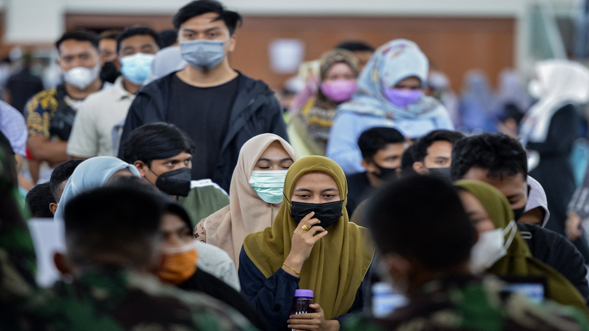 Image for the title: Indonesia's easing of COVID-19 curbs seen driven by economics 