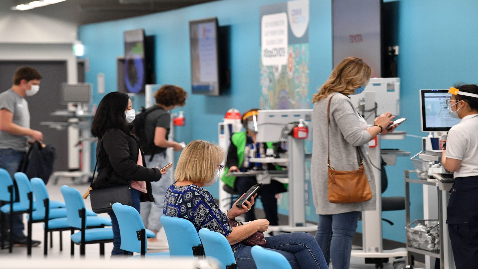 Image for the title: Australia's Victoria to lift COVID-19 curbs, Sydney cases rise 