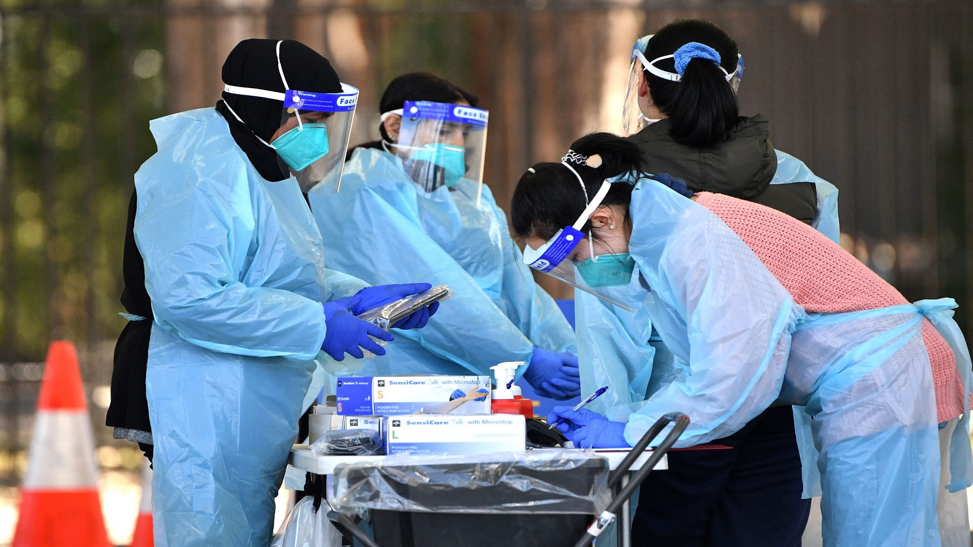 Image for the title: Sydney posts record daily COVID-19 cases 