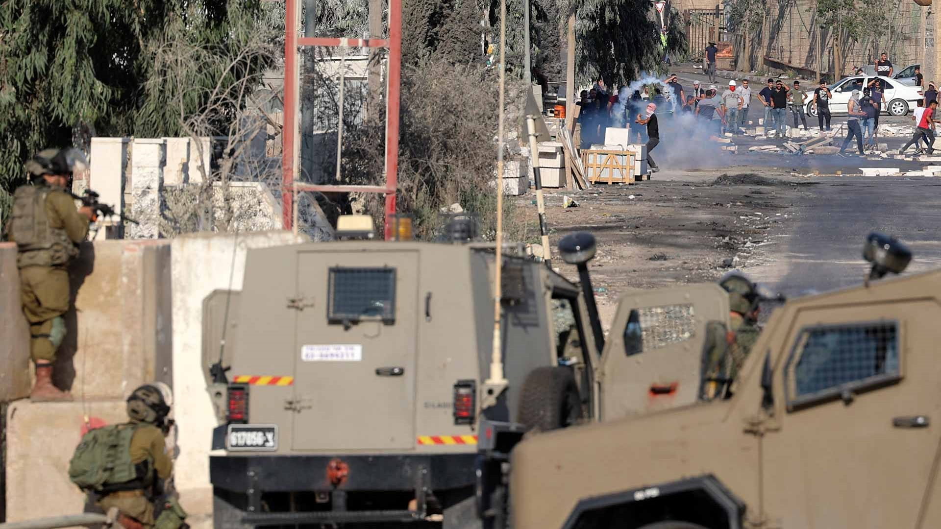 Image for the title: Palestinian shot dead by Israeli soldiers in West Bank clashes 