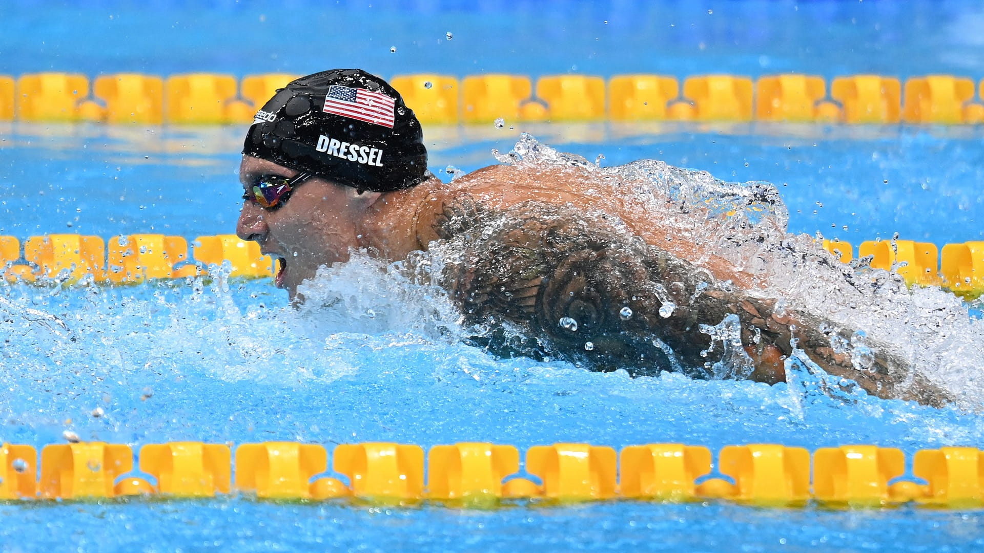 Image for the title: Dressel wins Olympic 100m butterfly gold medal 