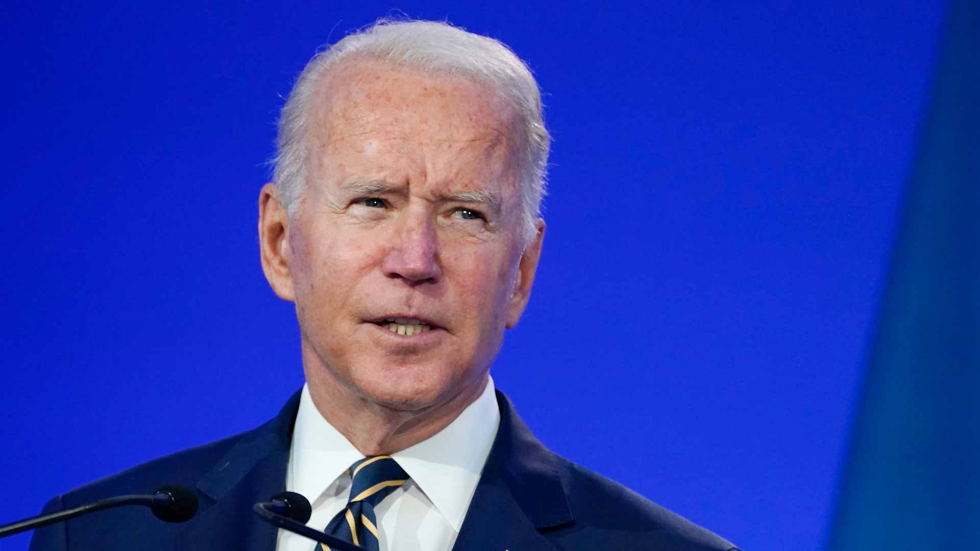Image for the title: Biden tells leaders U.S. will meet climate goals 
