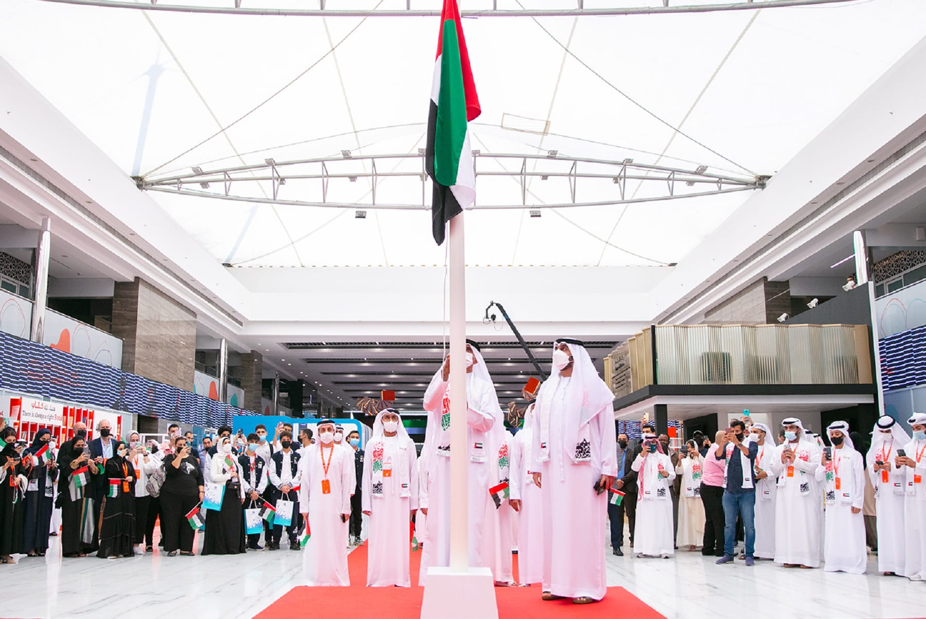 Image for the title: The UAE Flag rises high at Sharjah International Book Fair 