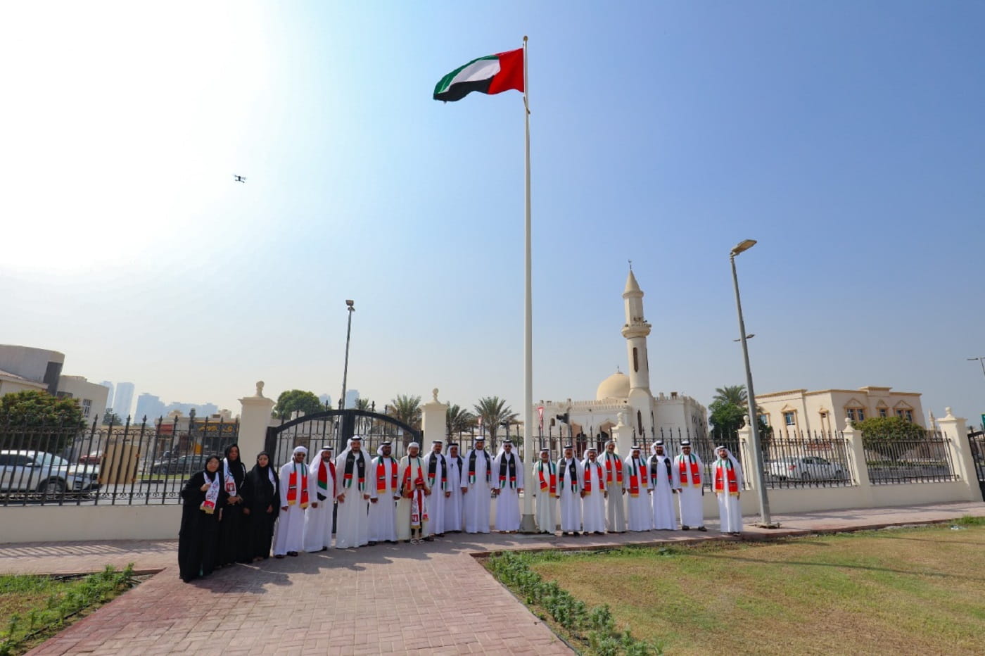 Image for the title: Al Khalidiya Council raises UAE flag as pledge of allegiance 