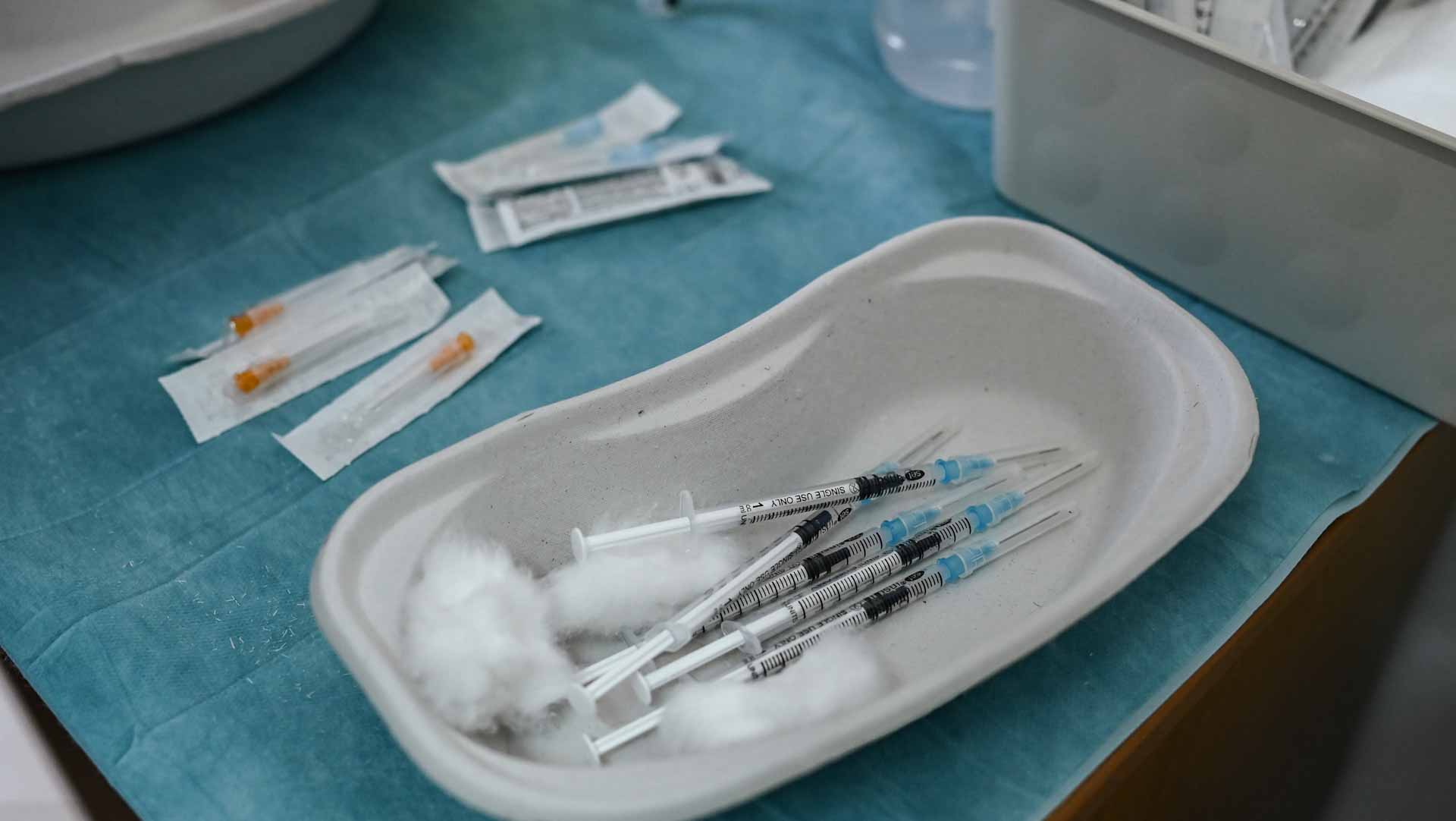 Image for the title: Unvaccinated in Greece face new restrictions as COVID cases soar 