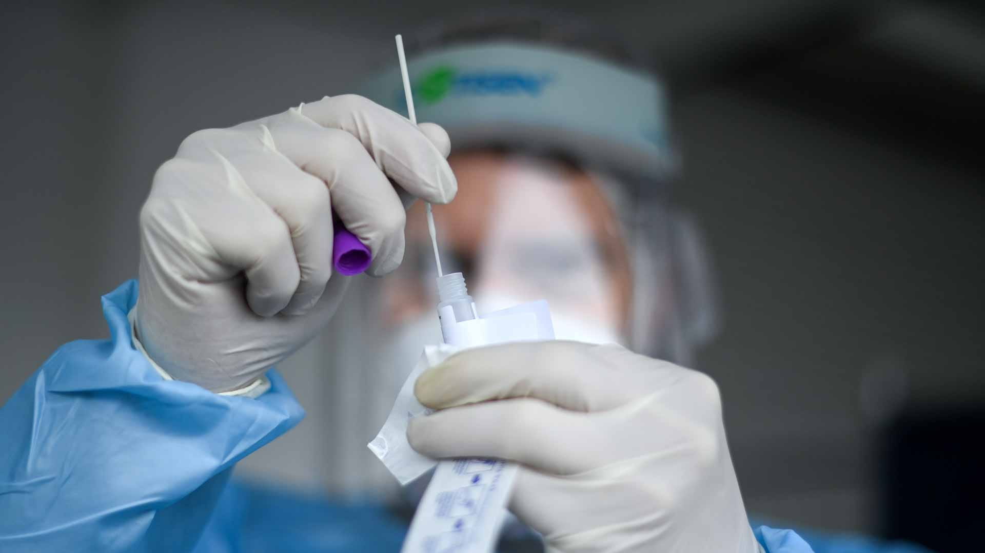 Image for the title: Global COVID-19 cases near 250 million as Delta surge eases 