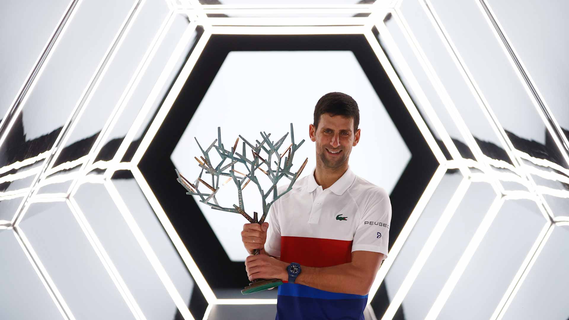 Image for the title: Djokovic downs Medvedev to claim record sixth Paris Masters title 