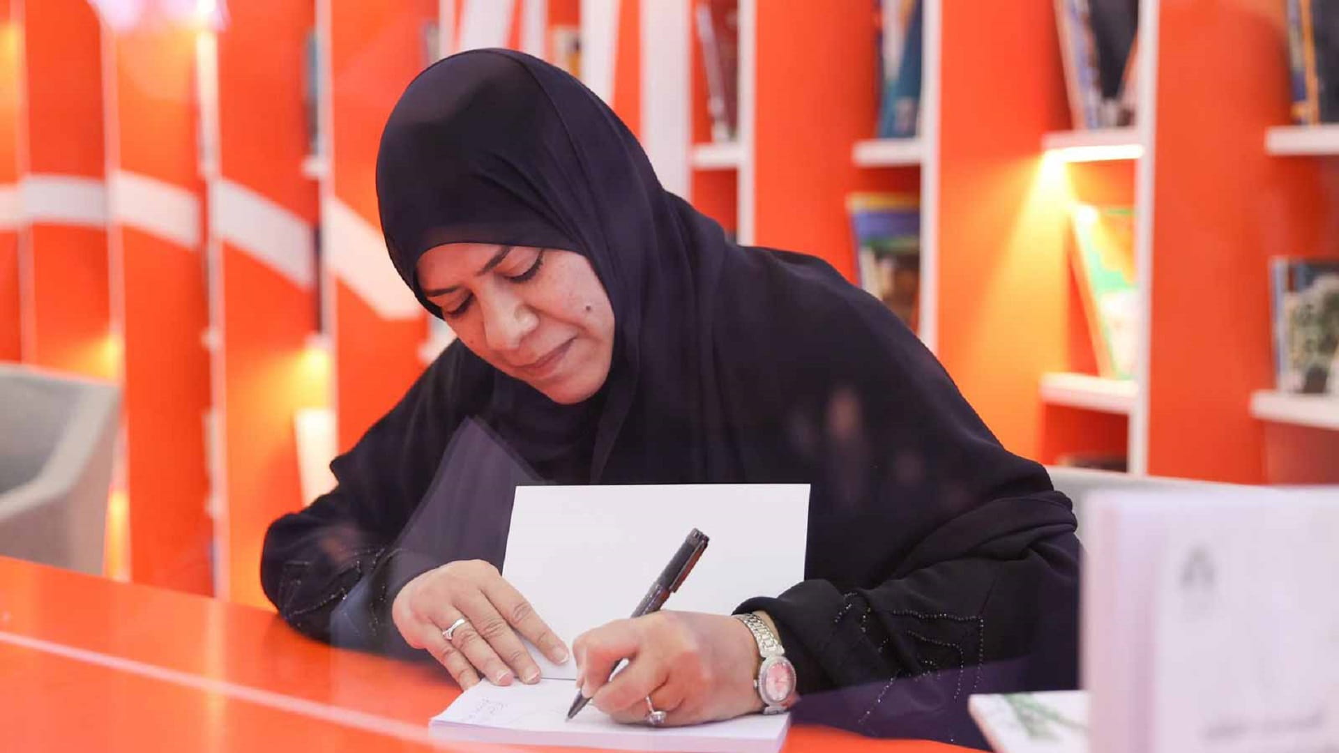 Image for the title: SCFA Cultural and Media Office holds a signing ceremony at SIBF 
