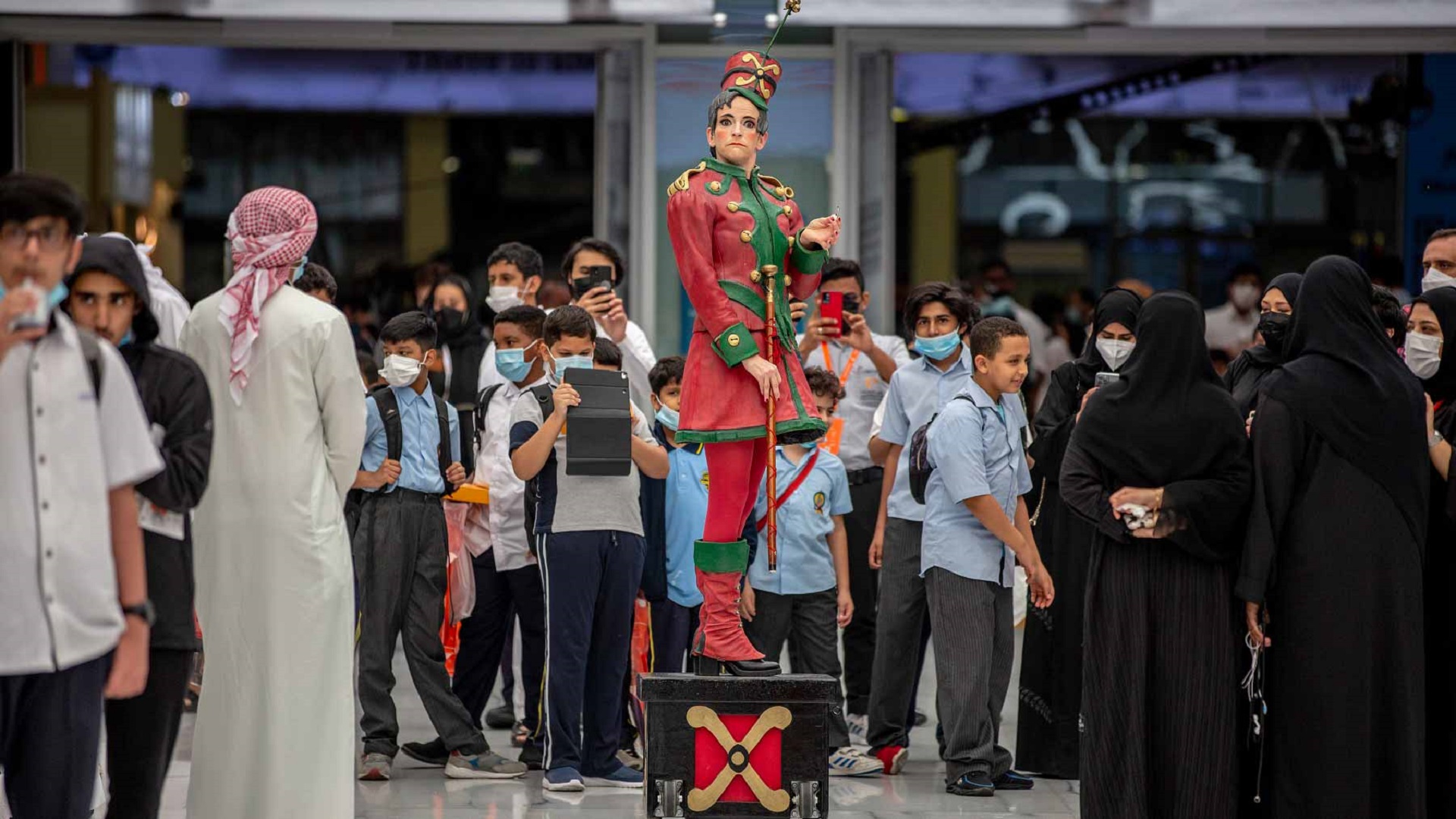 Image for the title: Baton-waving orchestra conductor directs visitor traffic at SIBF 