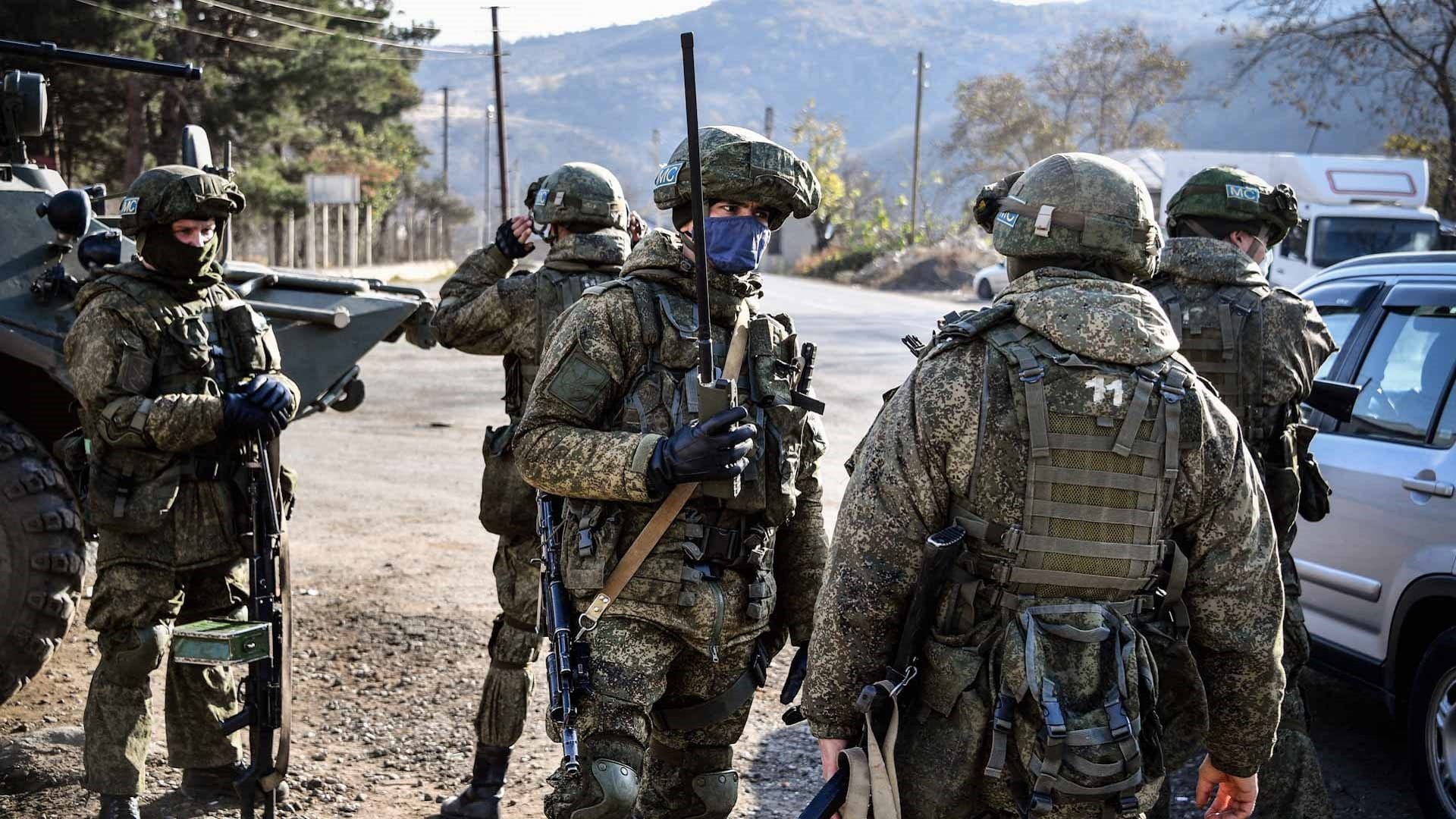 Image for the title: Armenia says 12 of its soldiers captured by Azerbaijan 