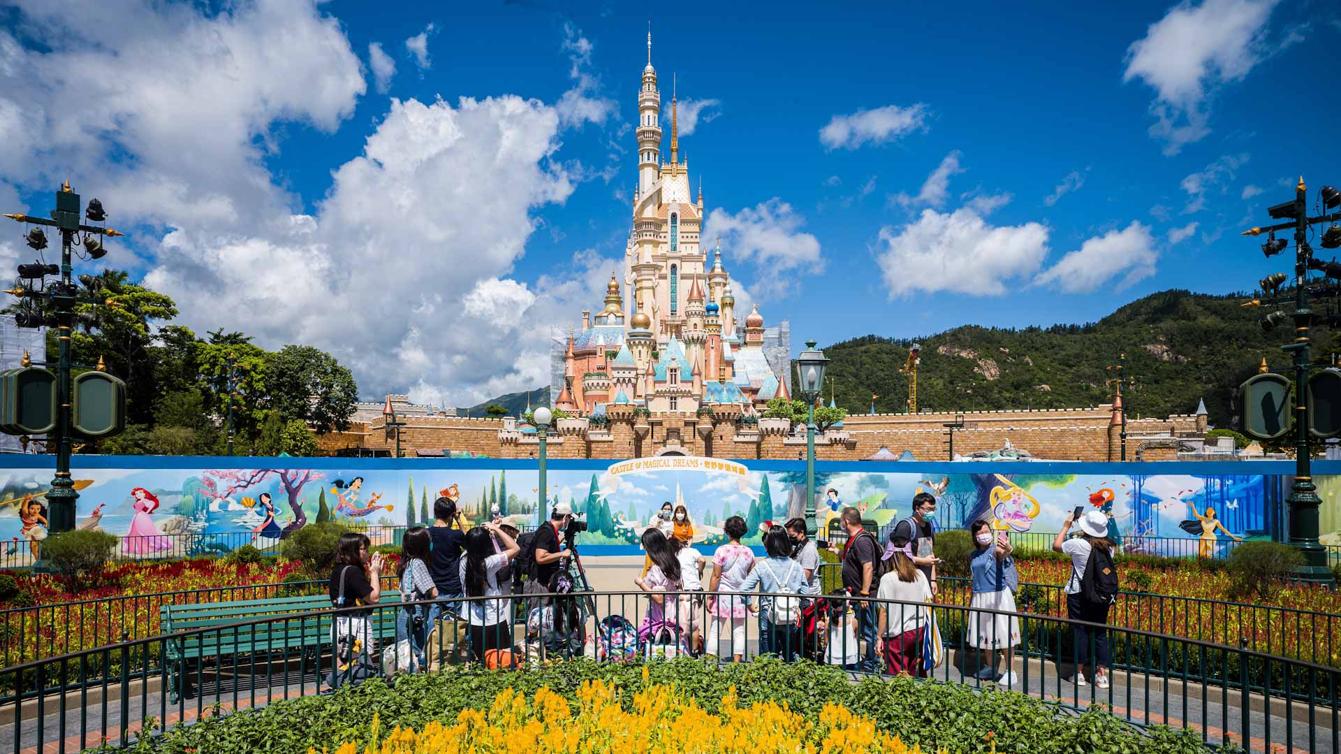 Image for the title: HK Disneyland closes for one day as staff take COVID-19 tests 
