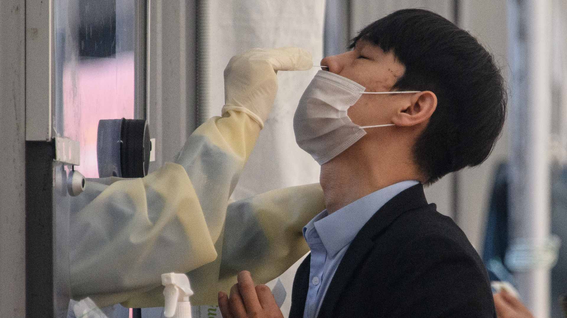 Image for the title: S.Korea reports record new COVID-19 cases 