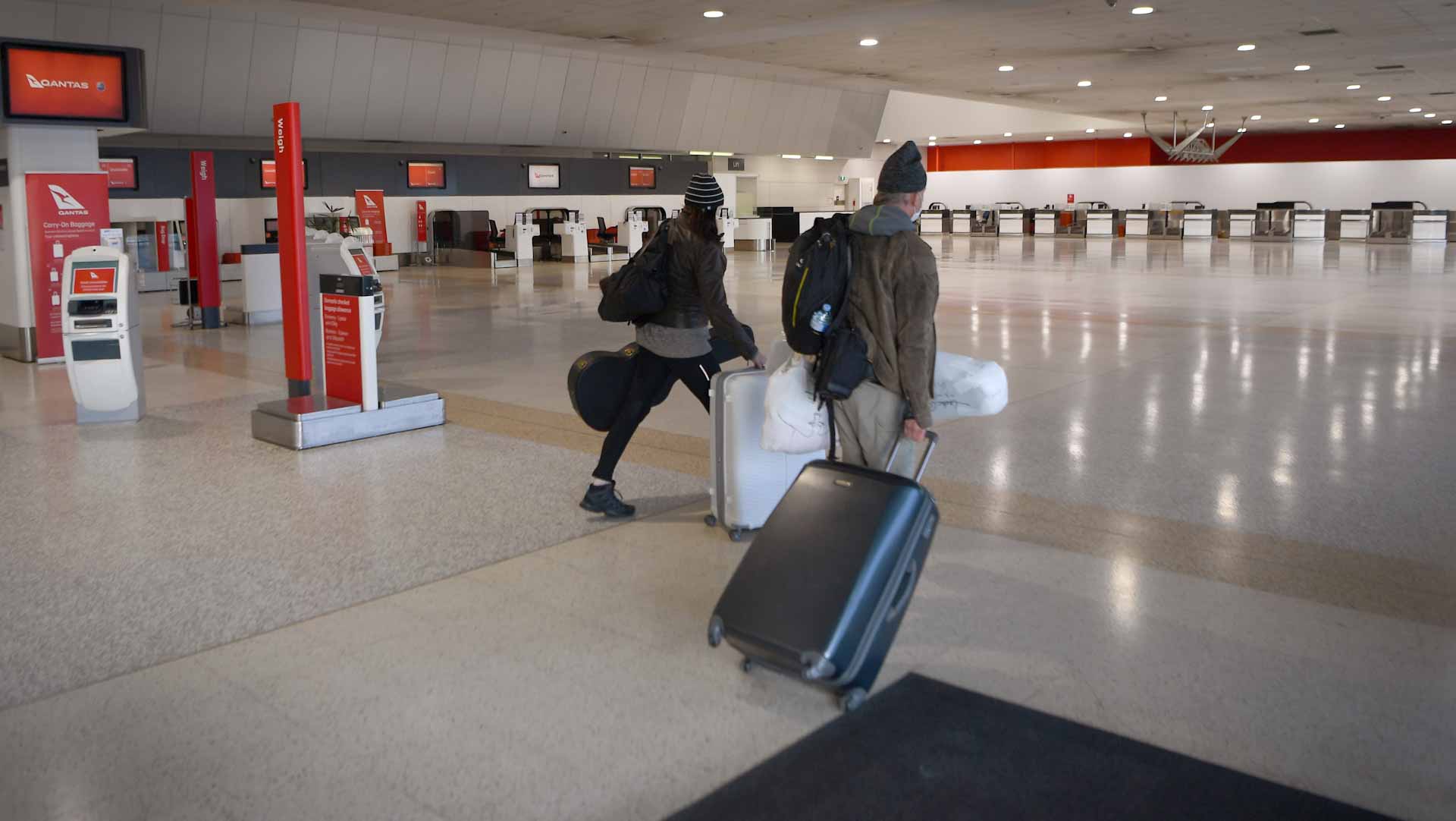 Image for the title: Australia sets out travel curbs from virus-hit southern Africa 