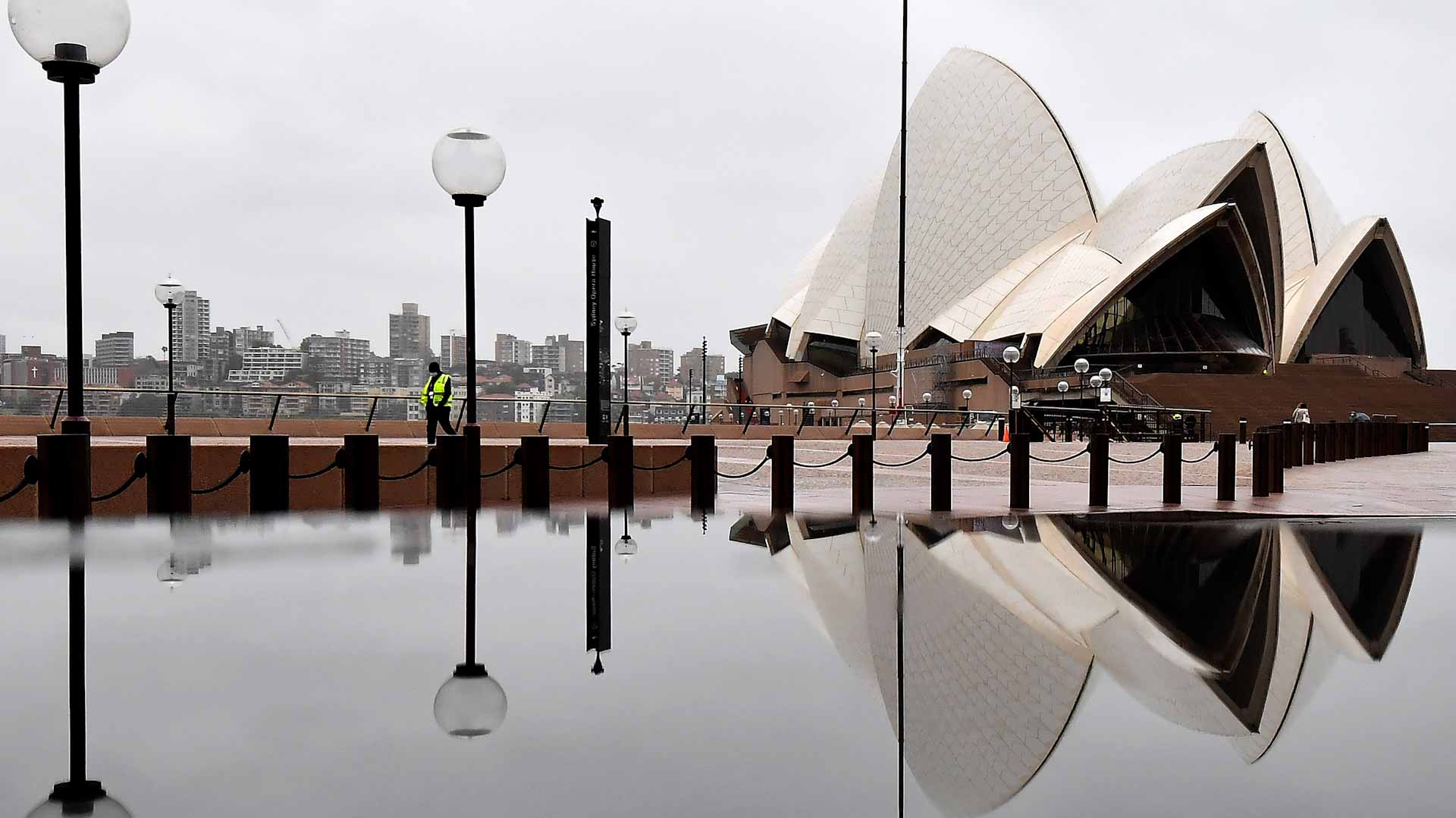 Image for the title: Australia urgently tests arrivals as COVID detected amid Omicron 