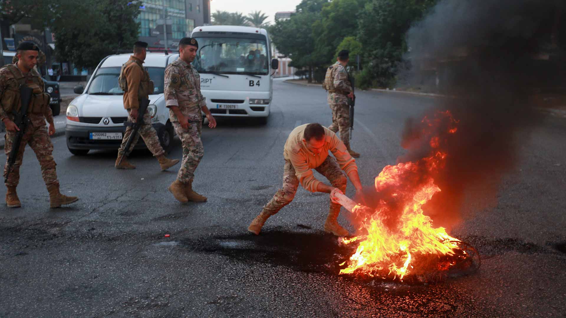 Image for the title: Lebanese protesters block roads over economic meltdown 