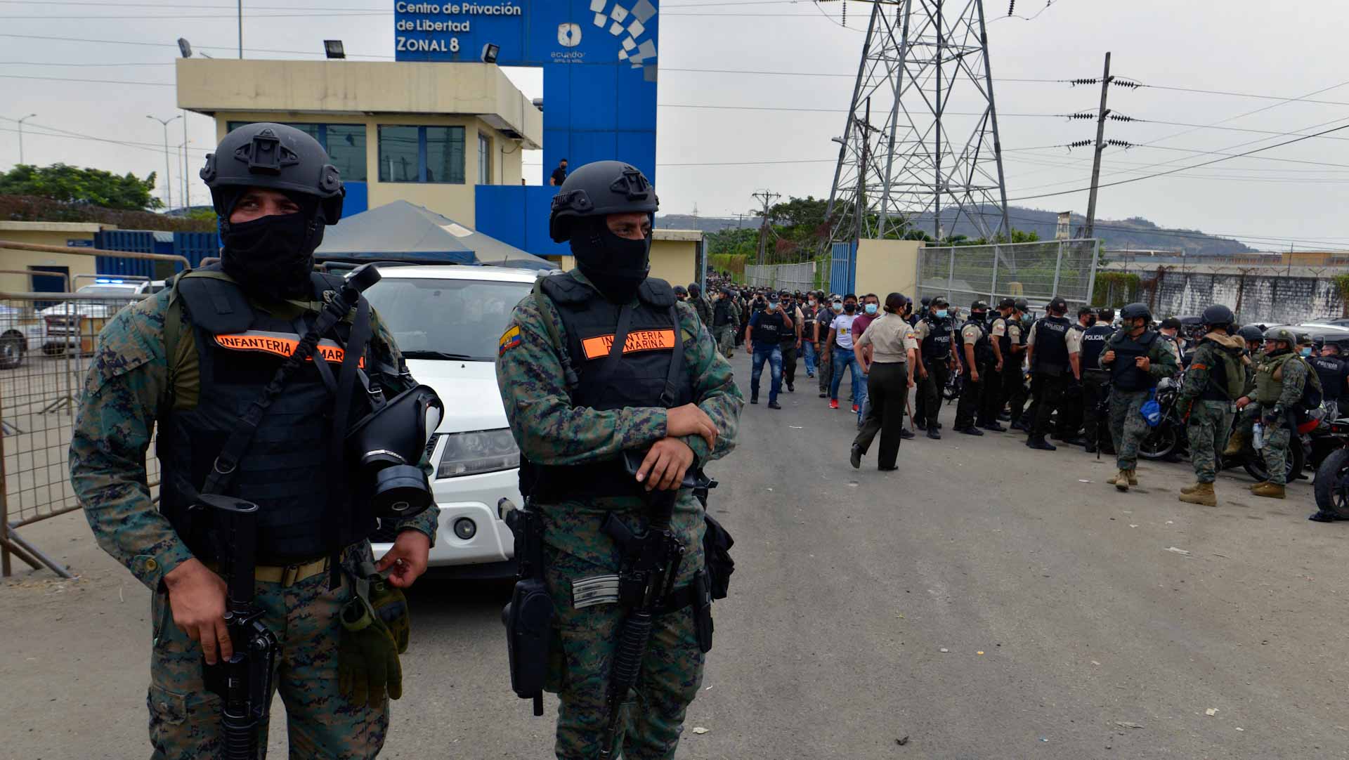 Image for the title: Four wounded in fresh inmate clash at riot-hit Ecuador prison 