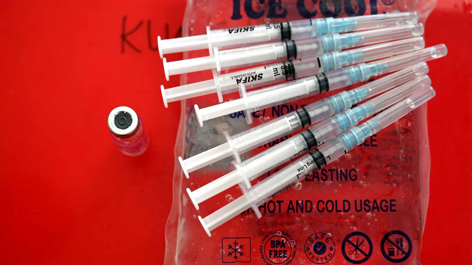 Image for the title: Amid COVID-19 booster data dilemma, EU nations' plans diverge 