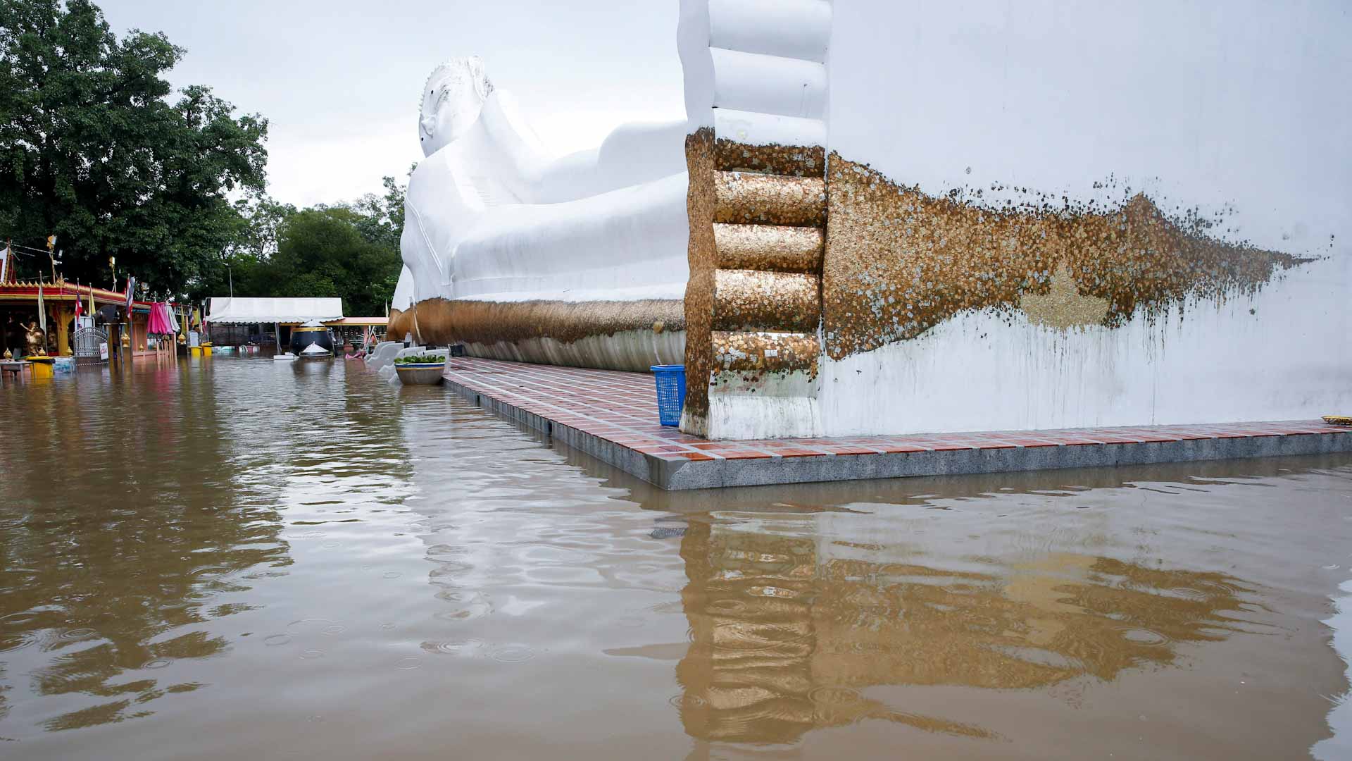 Image for the title: Temples underwater as floods hit historic Thai city 