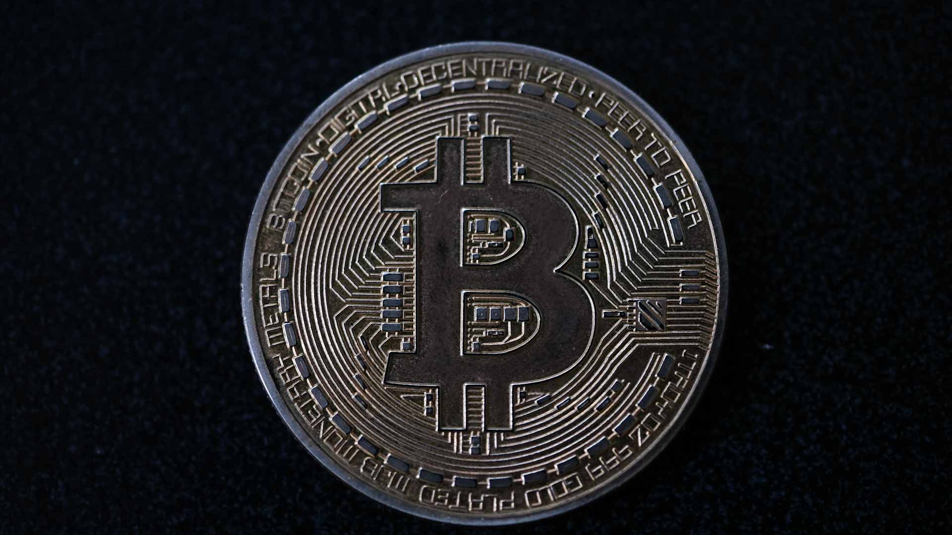 Image for the title: Bitcoin soars to $50,000 again on institutional demand 