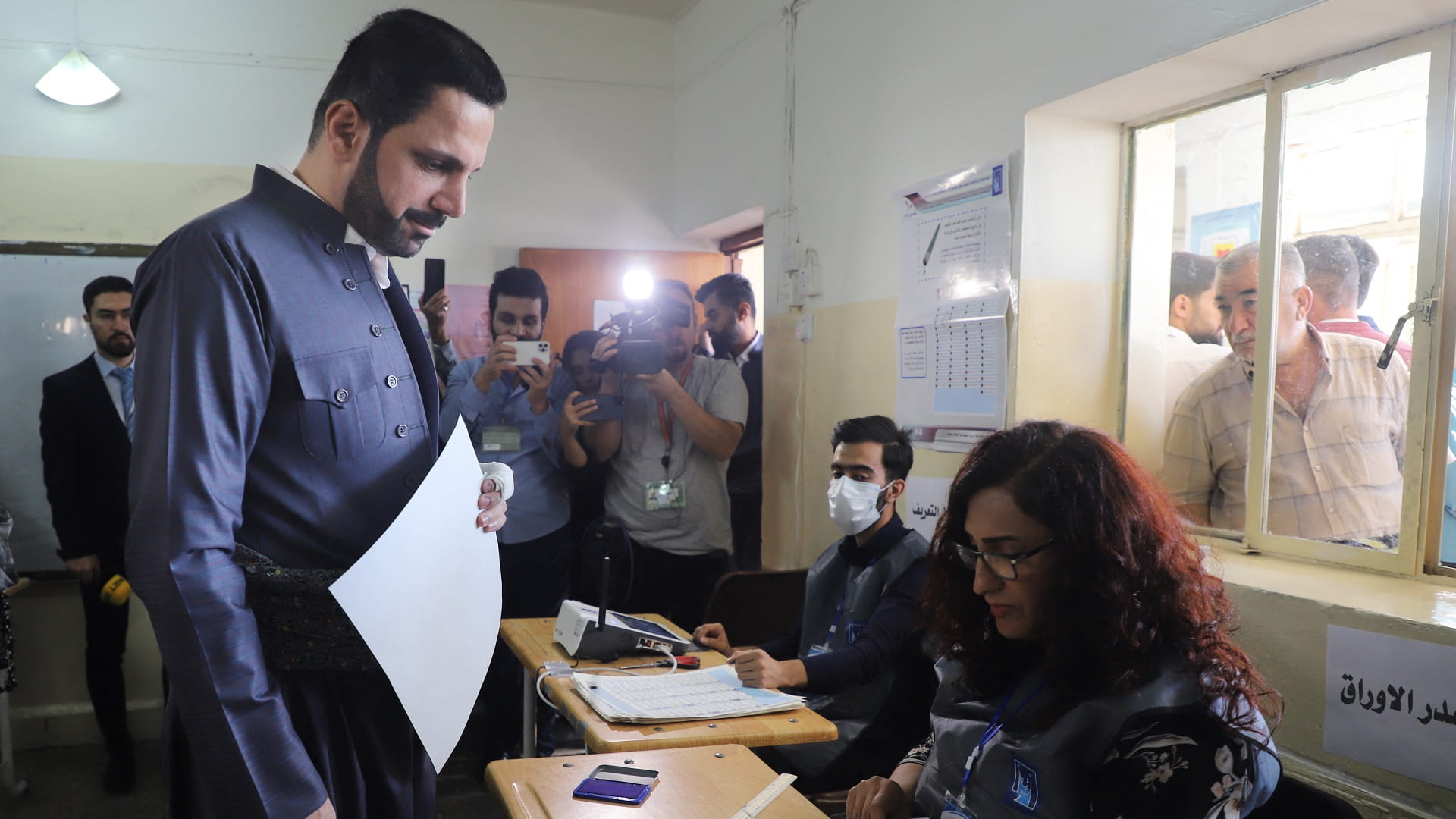 صورة بعنوان: العراقيون يصوتون في انتخابات تشريعية مبكرة من دون أمل بالتغيير 