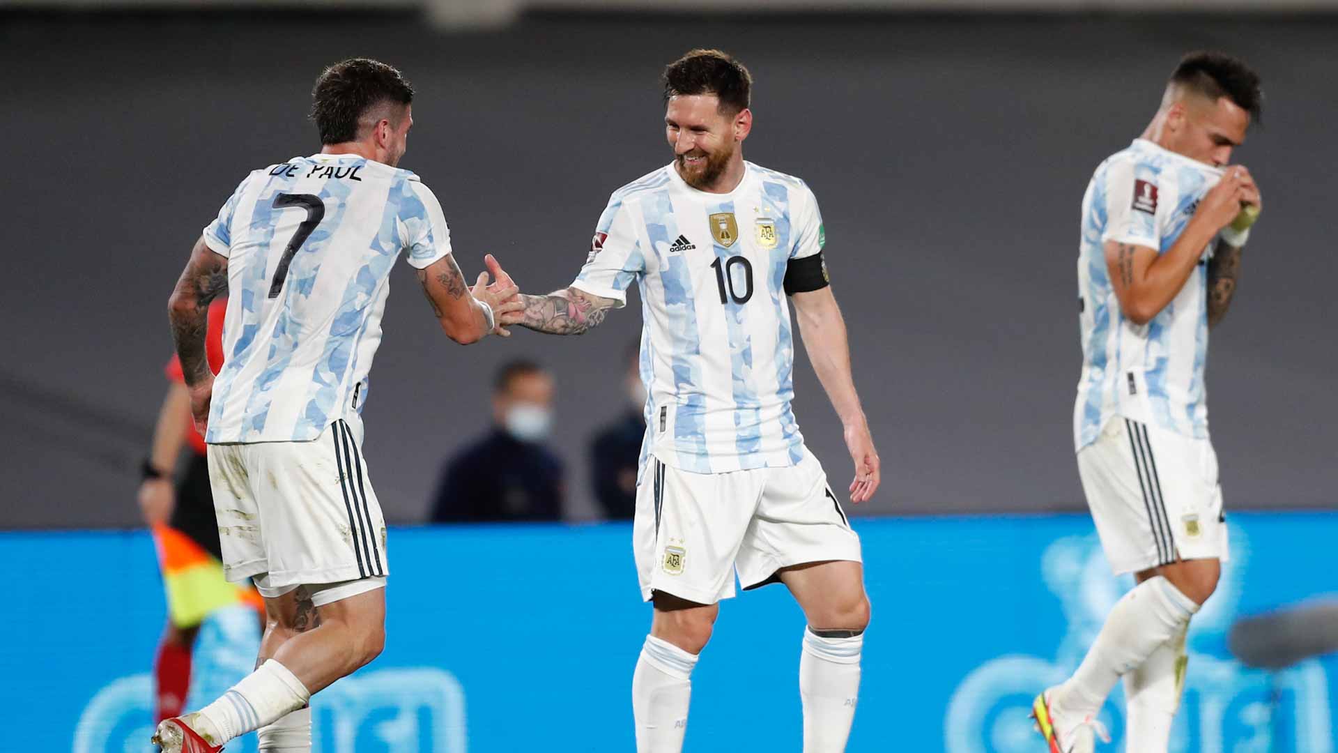Image for the title: Messi scores unusual goal as Argentina beat Uruguay 3-0 