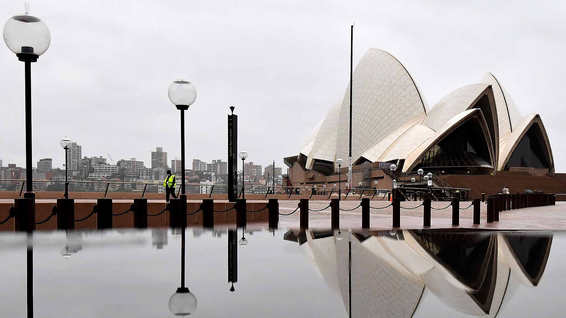 Image for the title: Sydney virus cases ease as focus shifts to reviving economy 