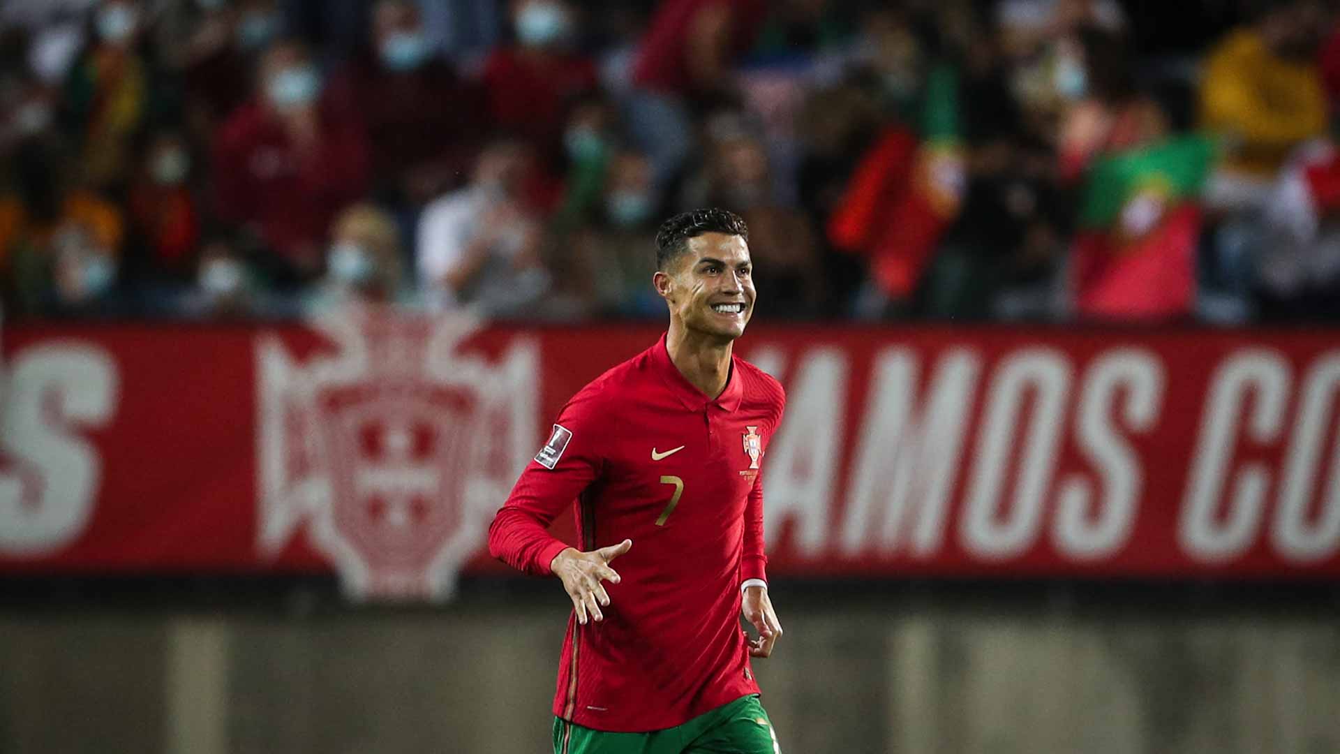 Image for the title: Ronaldo nets hat-trick as Portugal rout Luxembourg 