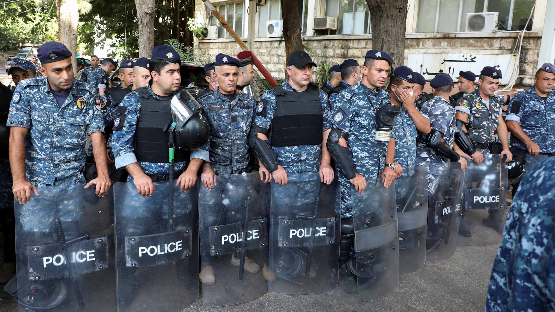 Image for the title: Gunfire kills two, wounds 12 at Beirut protest: hospital 