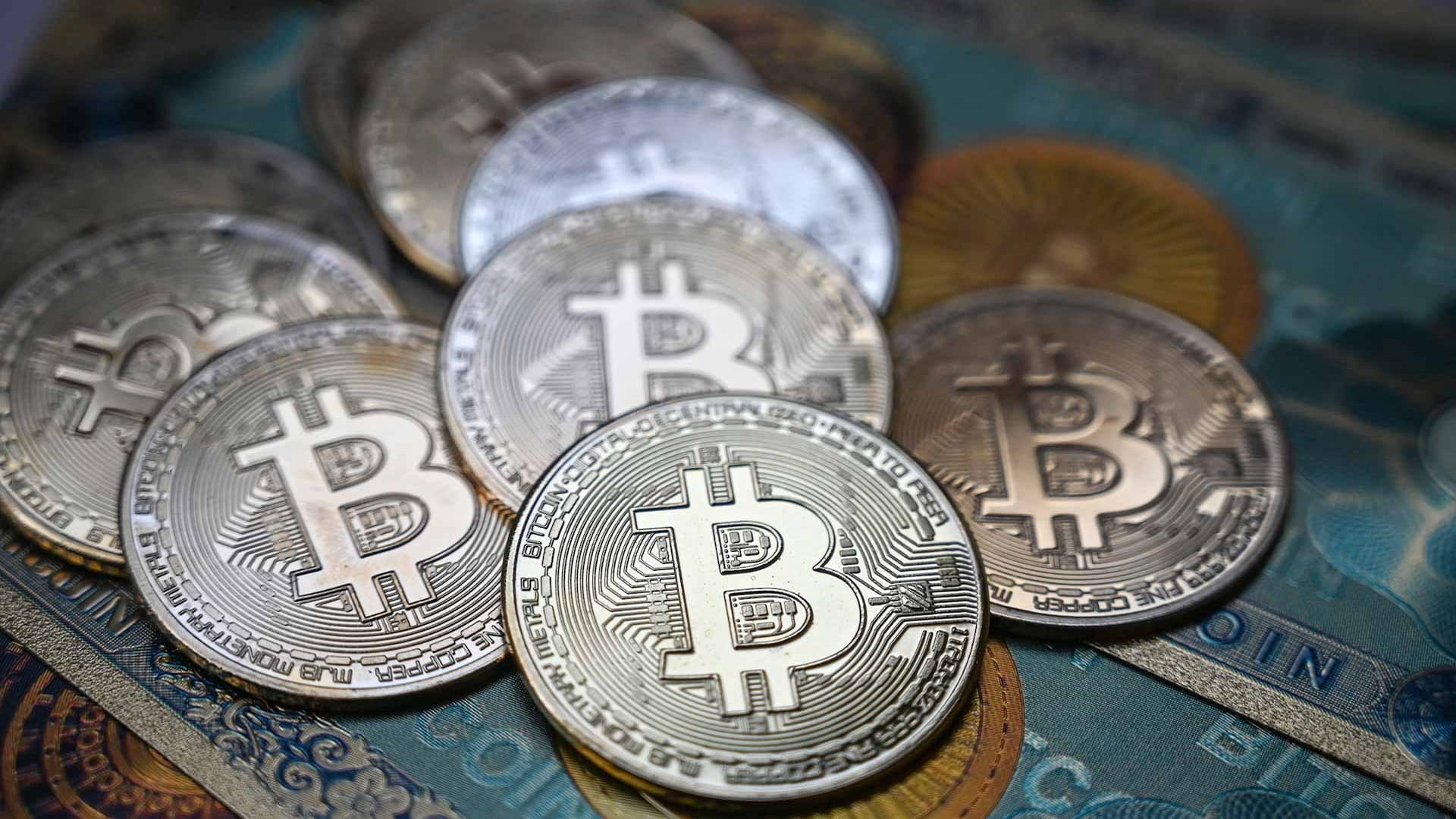 Image for the title: Bitcoin nears $60,000 as investors eye first U.S. ETFs 