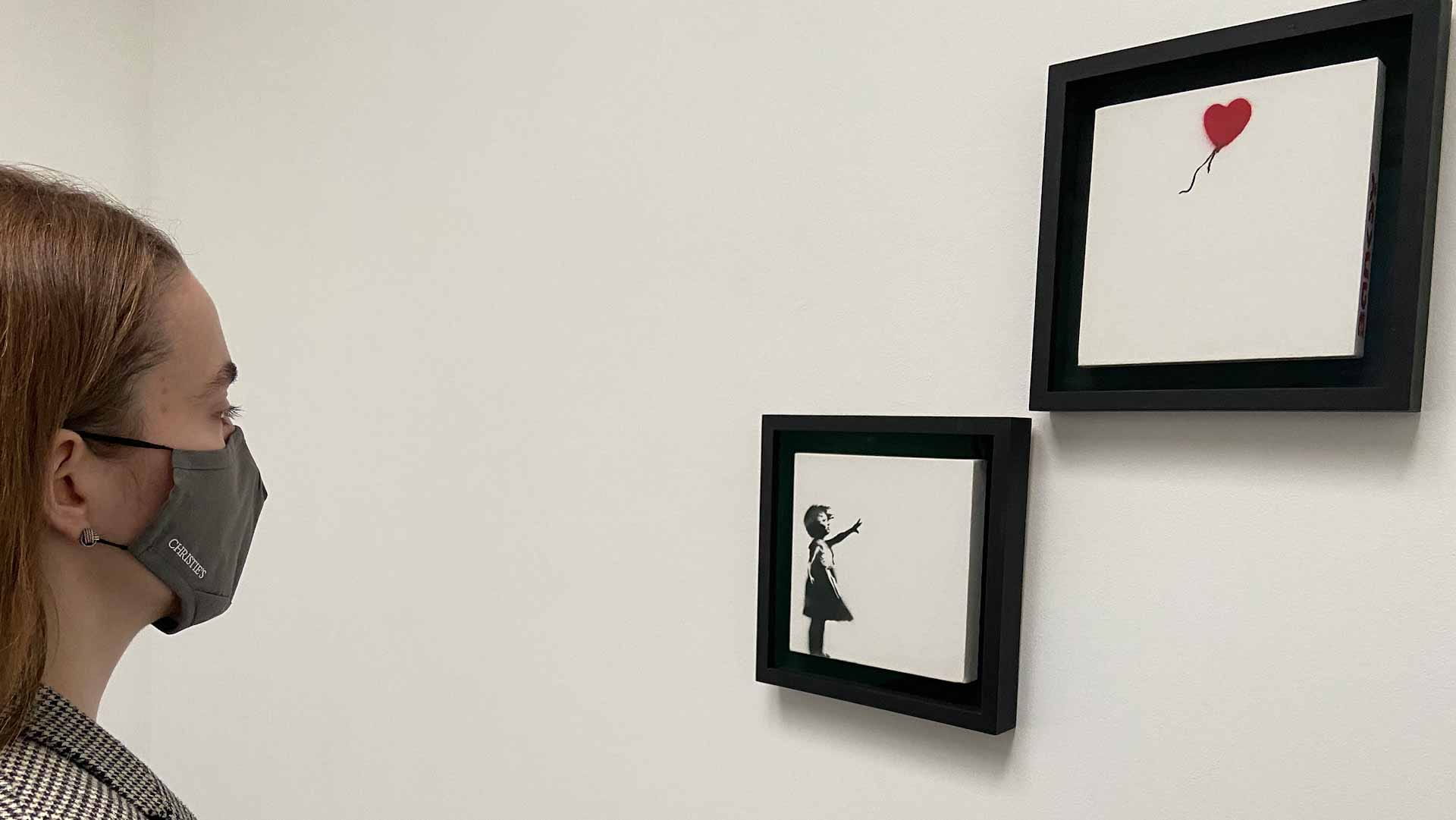 Image for the title: Version of Banksy 'Girl with Balloon' sells for £3.1 million 