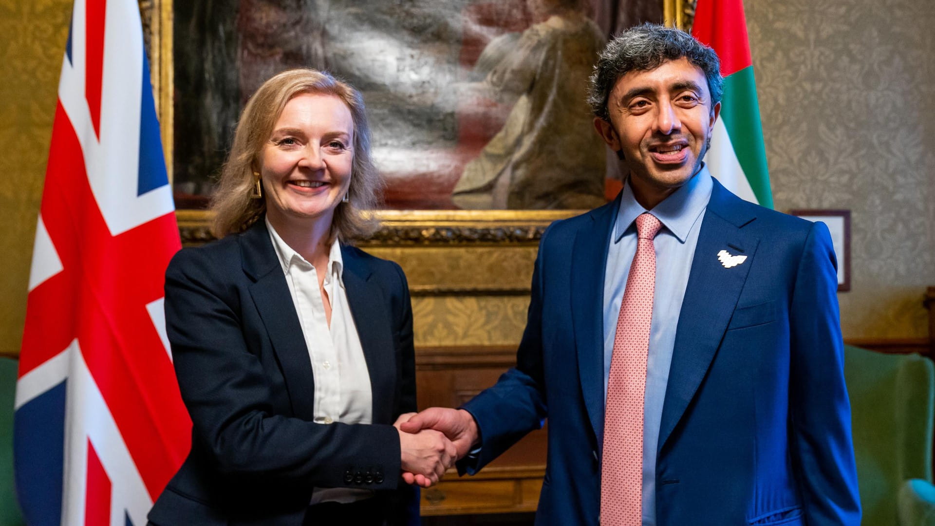 Image for the title: Abdullah bin Zayed, UK Secretary of State review regional devts 