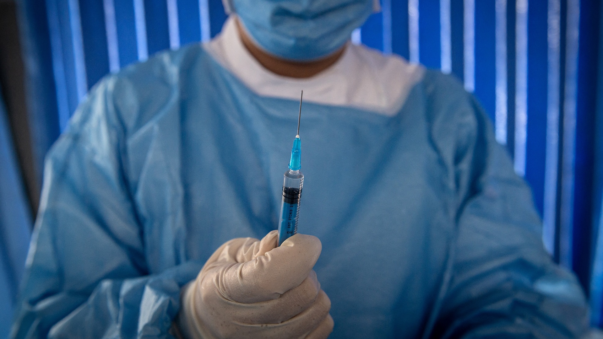 Image for the title: Beijing rolls out Covid-19 booster shots ahead of Olympics 