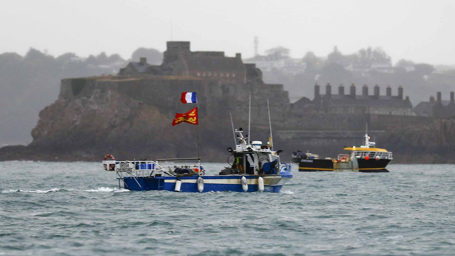 Image for the title: UK calls in French envoy over threats as fishing dispute deepens 