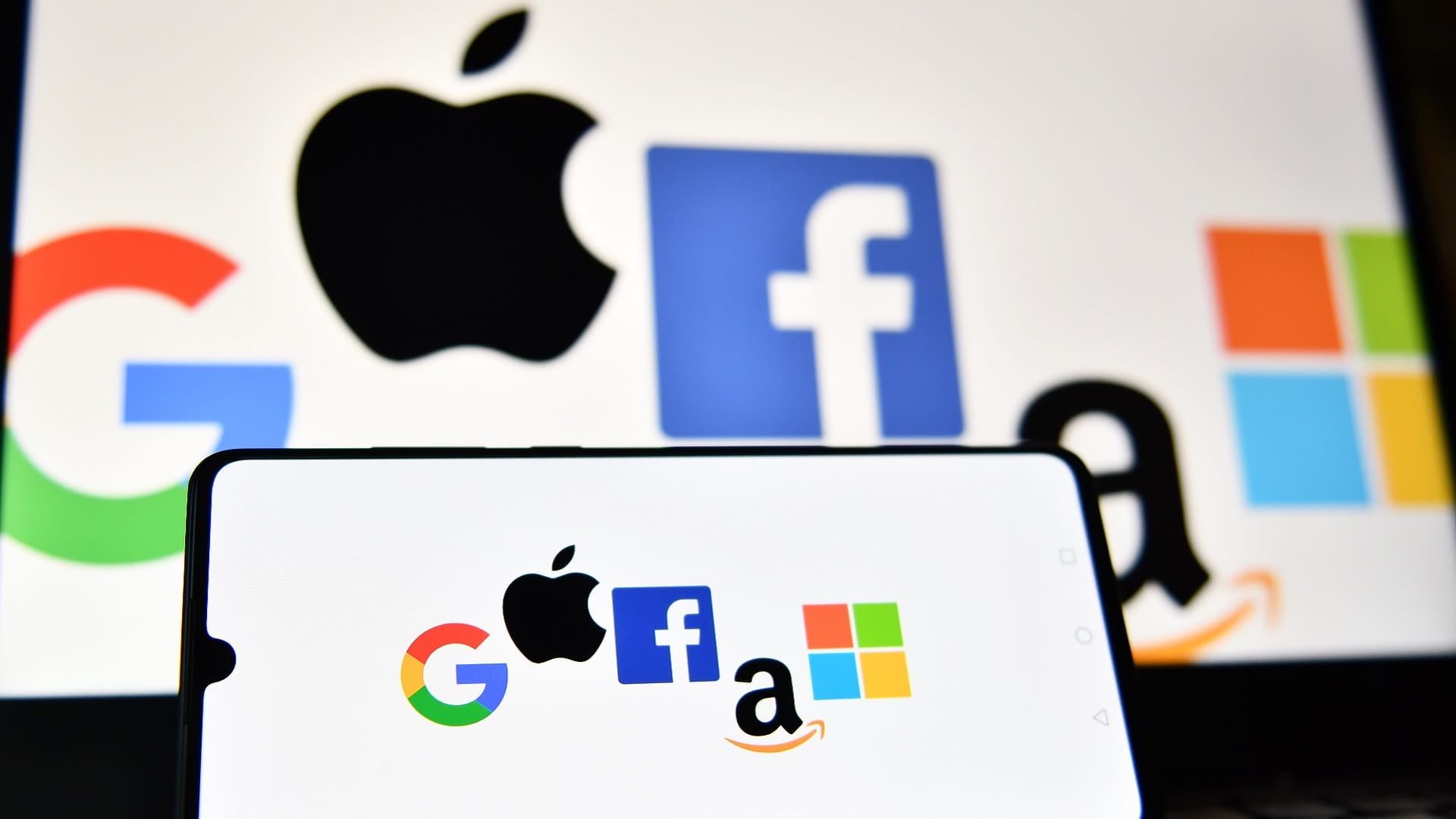 Image for the title: Microsoft nearly overtakes Apple as most valuable company 