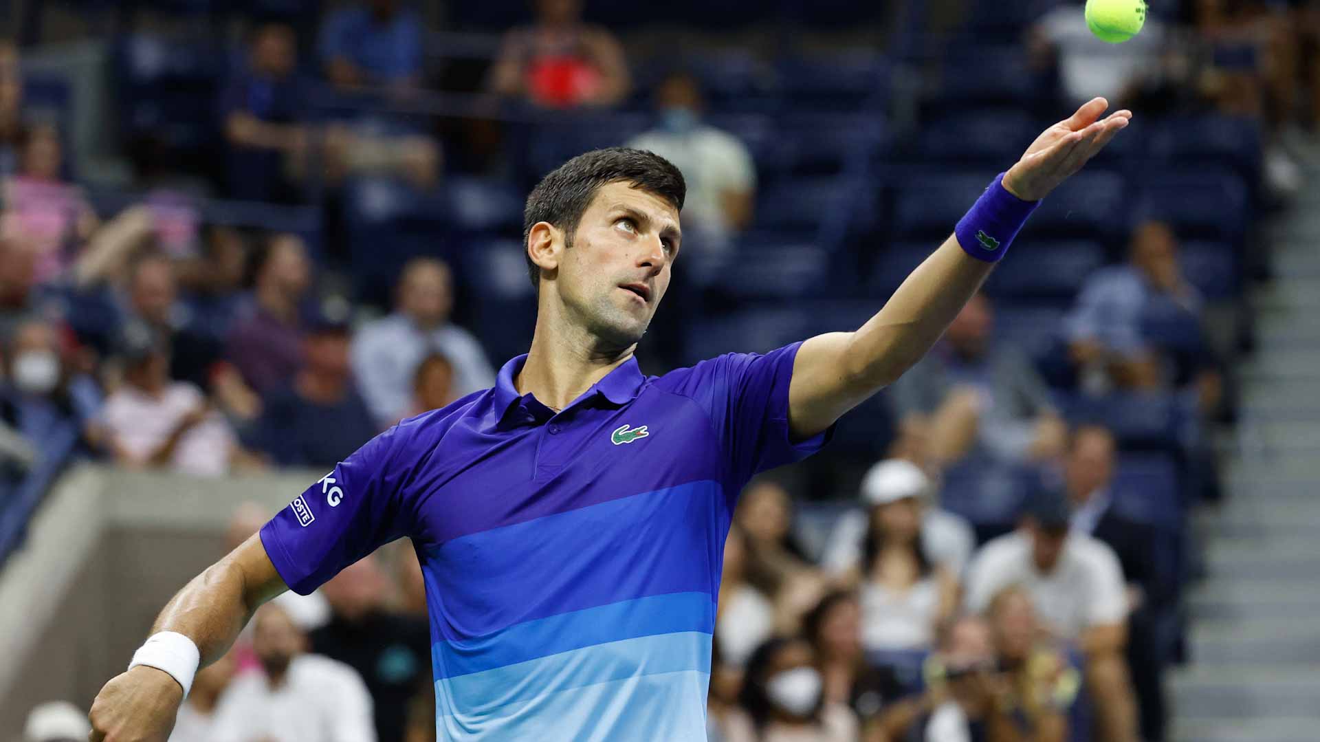 Image for the title: Djokovic takes first unsteady step toward calendar slam 