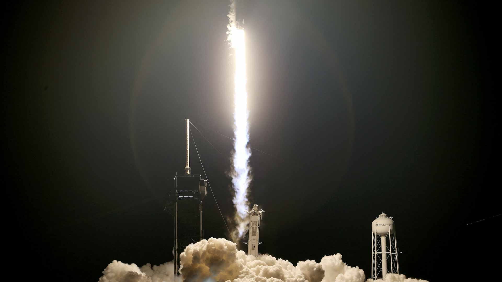 Image for the title: SpaceX all-civilian orbital crew completes historic mission 