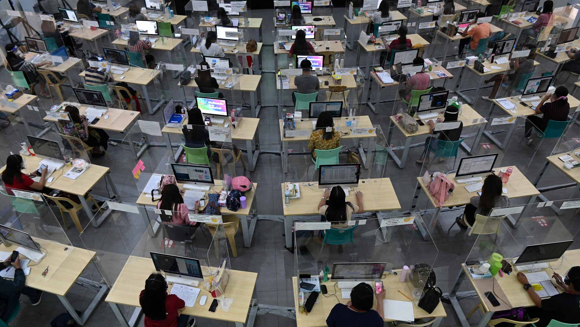 Image for the title: Philippines to reopen 120 schools for in-person classes 