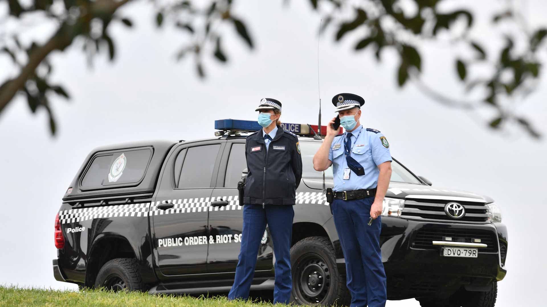 Image for the title: COVID-19 cases jump in Australia's as curbs ease  