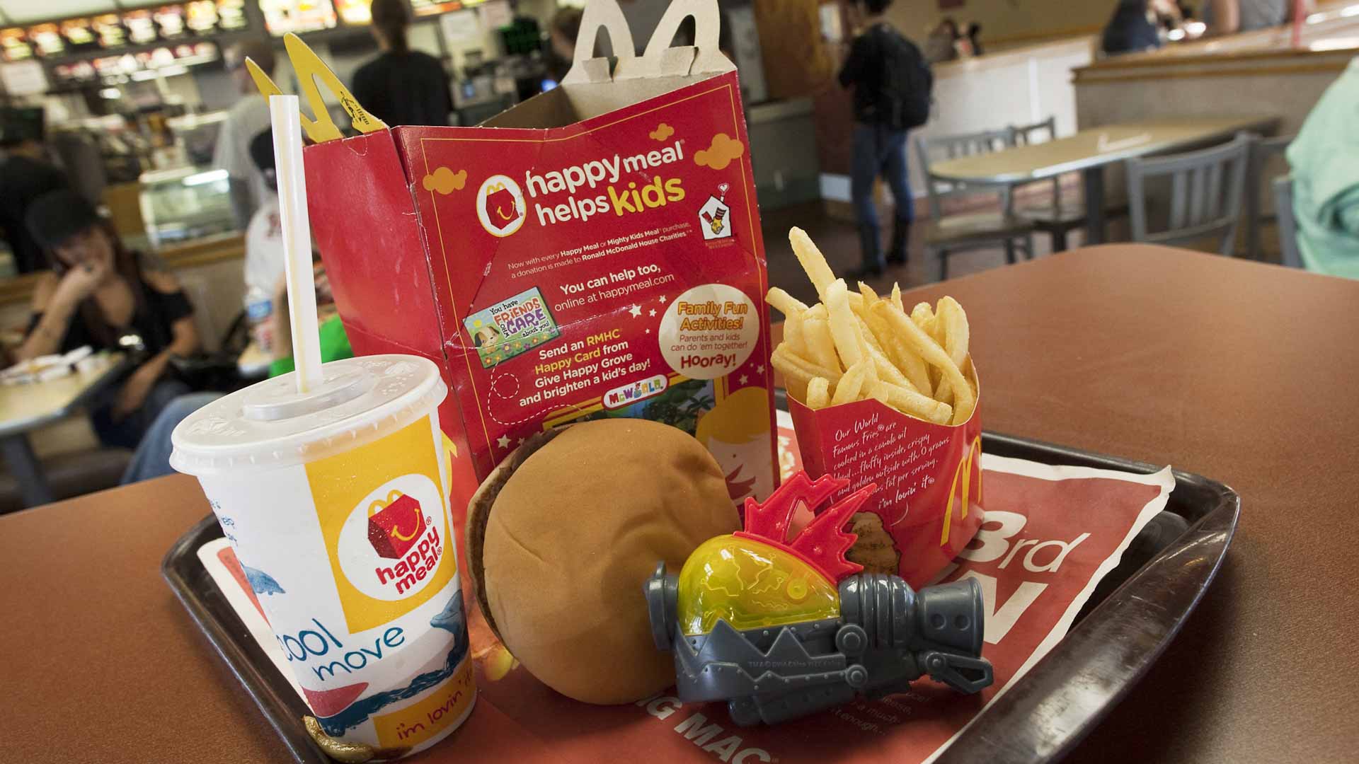 Image for the title: McDonald's Happy Meal toys to go green globally by 2025 