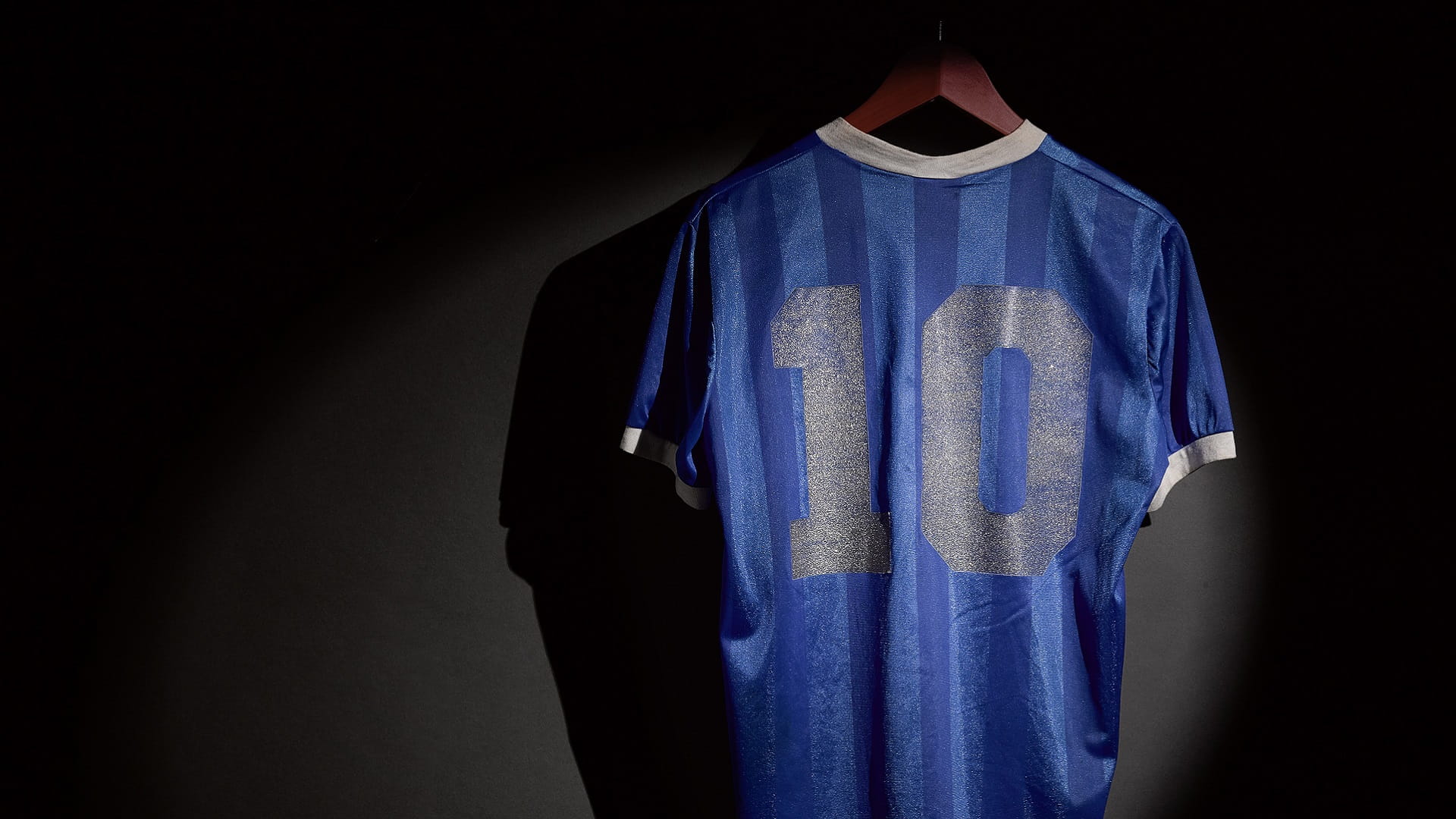 Image for the title: Maradona's daughter claims wrong jersey is up for auction 