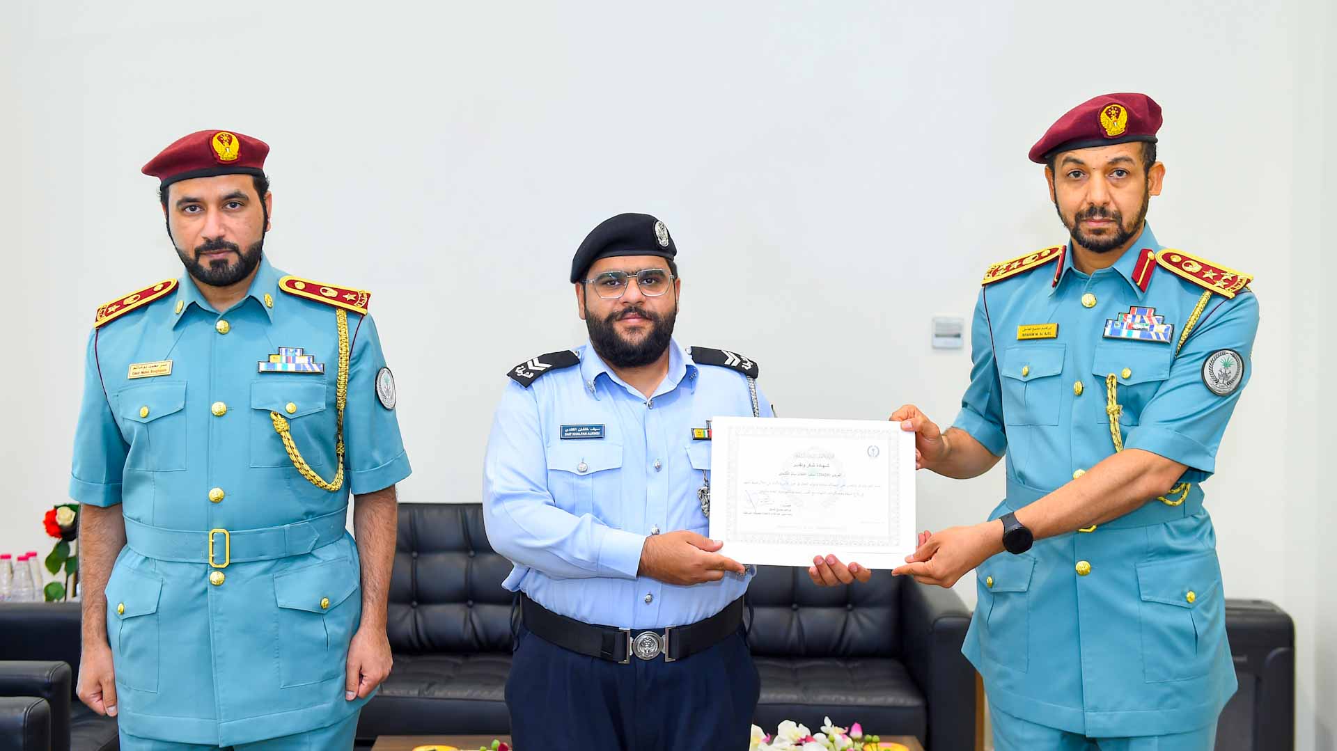Image for the title: Sharjah Police honours two of its employees 