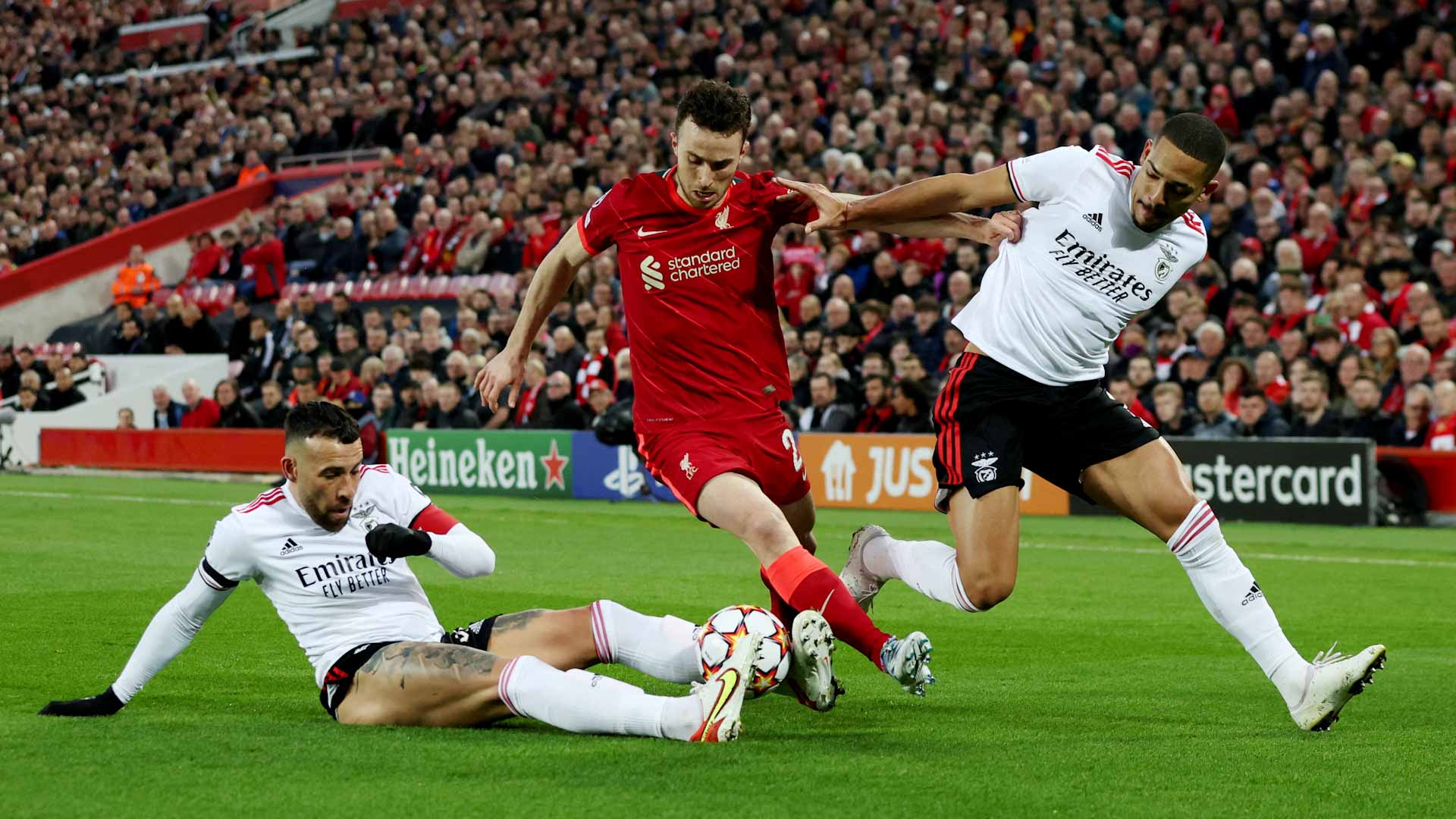 Image for the title: Firmino fires Liverpool into semis despite Benfica rally 