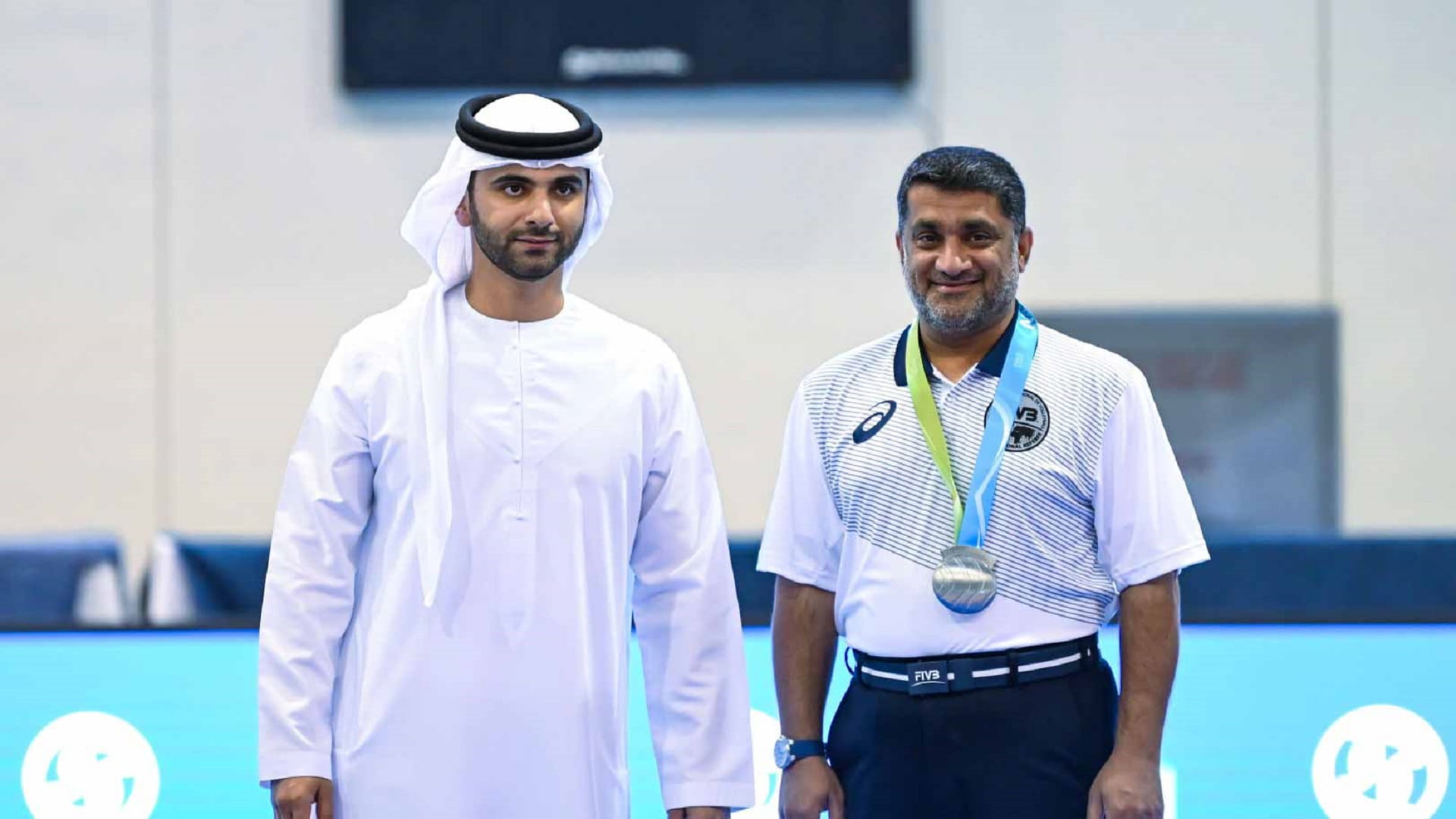 Image for the title: Mansoor bin Mohammed crowns winners of volleyball championship 