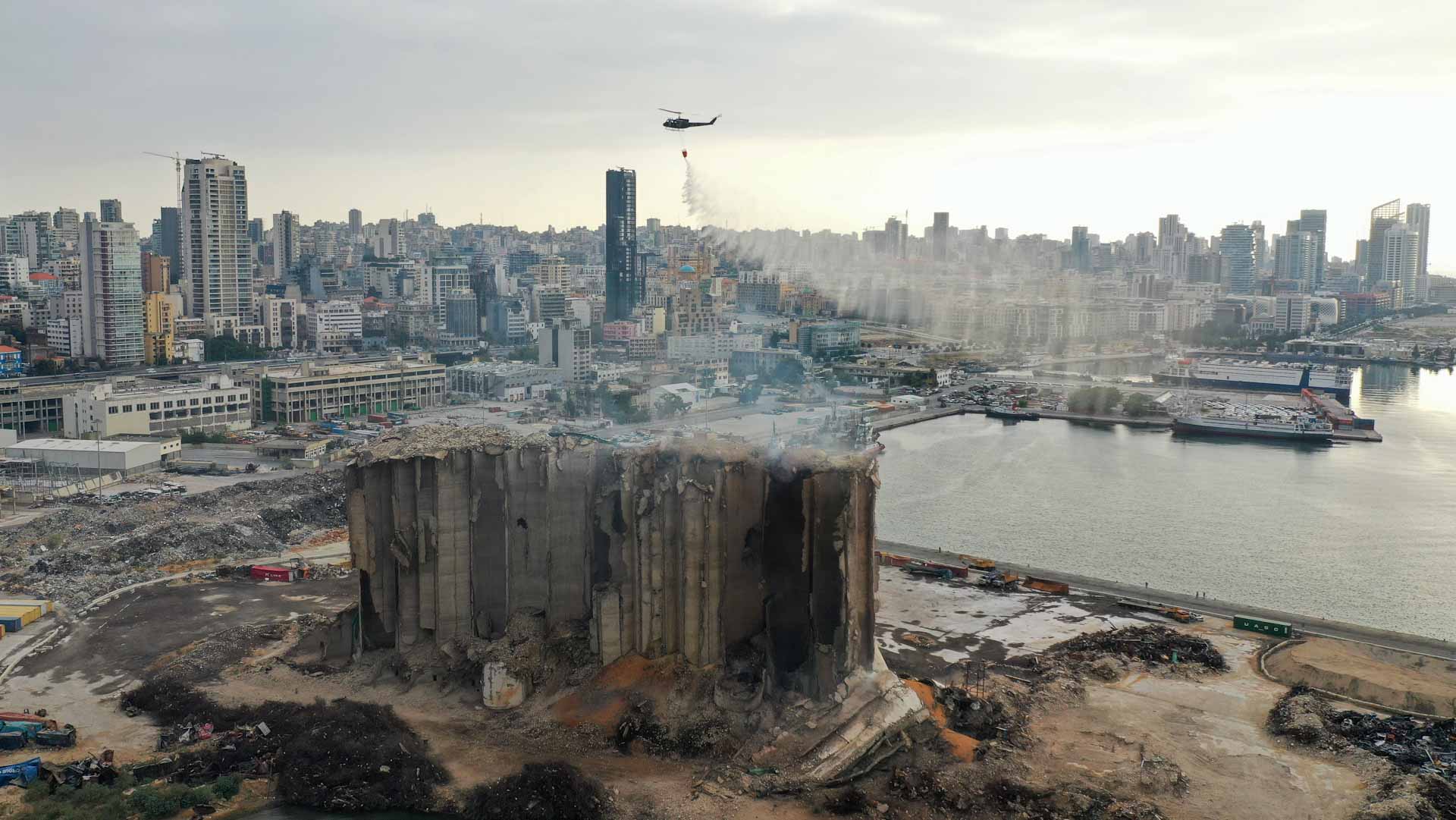 Image for the title: Beirut's blast-damaged grain silos partially collapse 