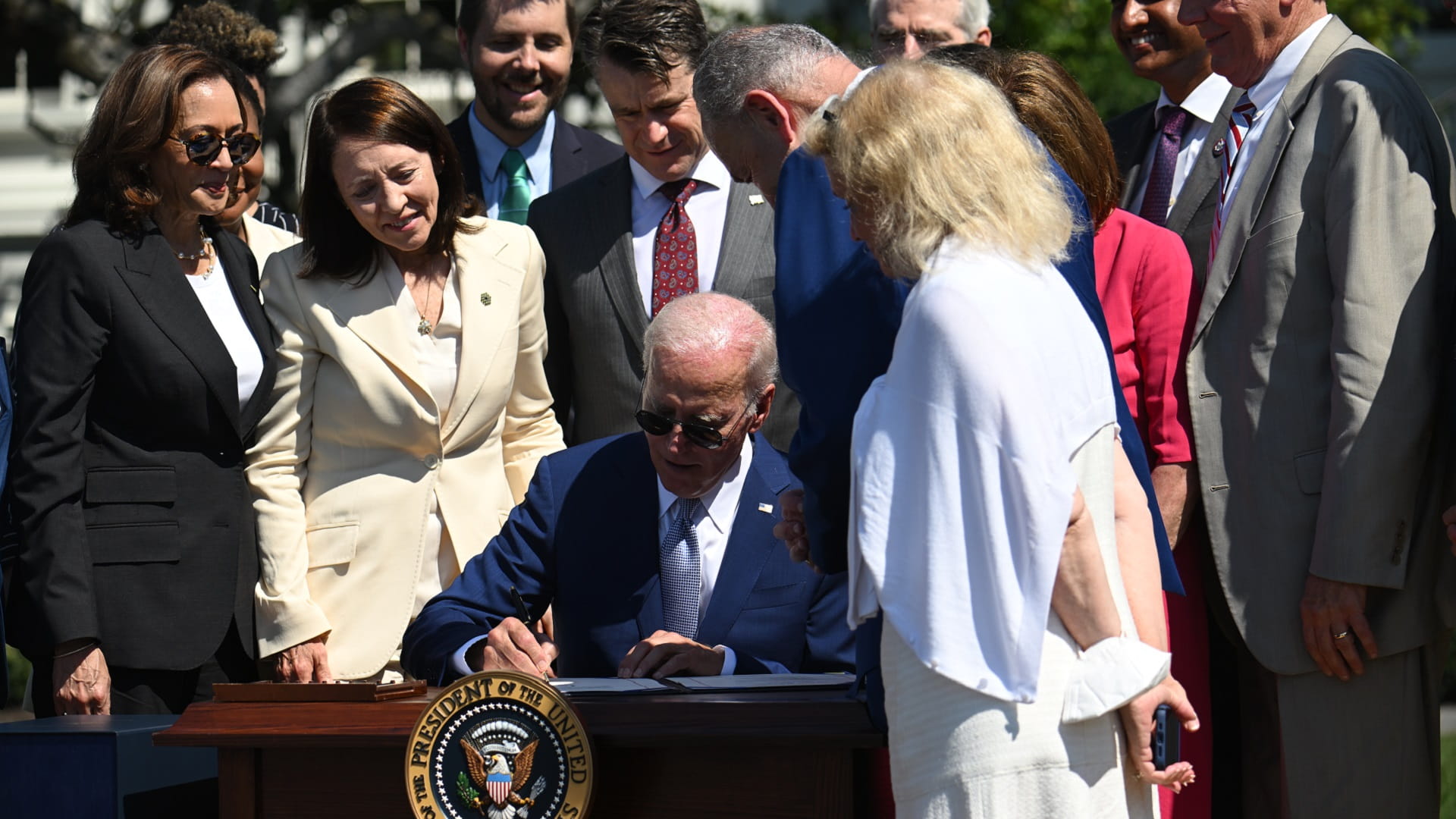 Image for the title: Biden signs major semiconductors invest. to compete against China 