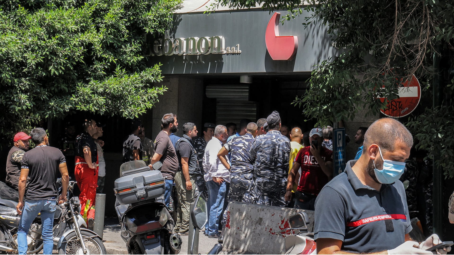 Image for the title: Gunman exits Lebanon bank, ending hostage situation 