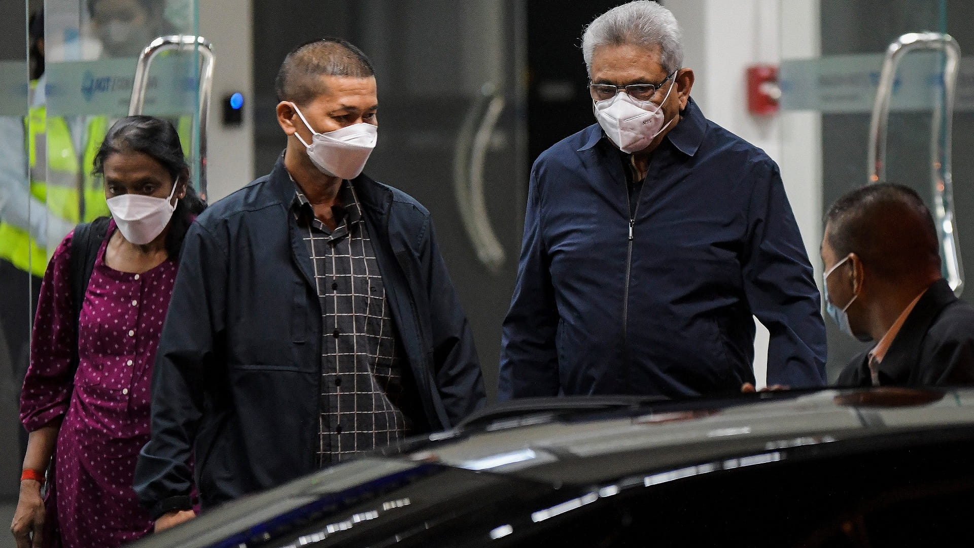 Image for the title: Sri Lankan ex-leader arrives in Bangkok after fleeing protests 