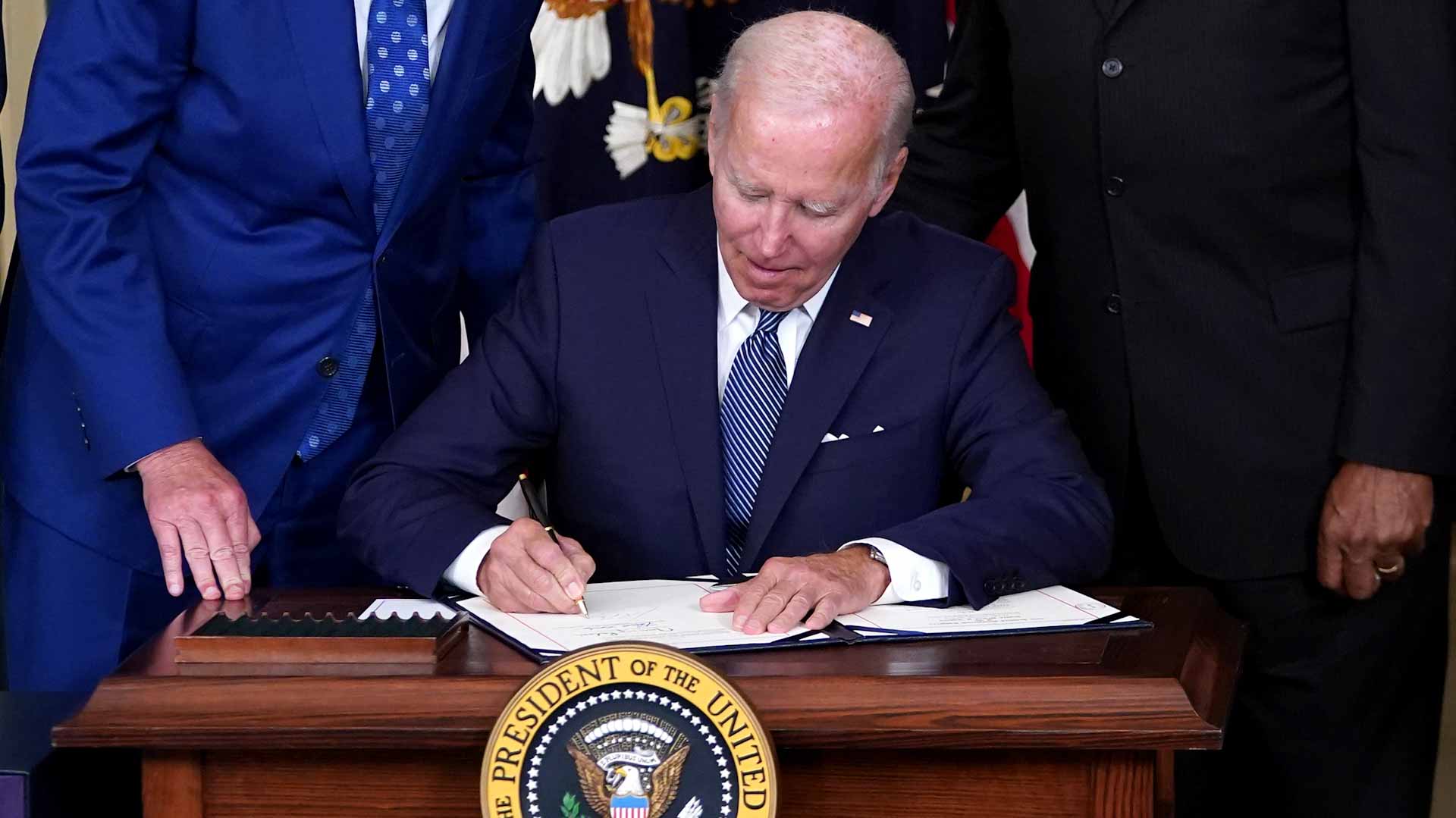 Image for the title: Biden signs major climate change, health care law 