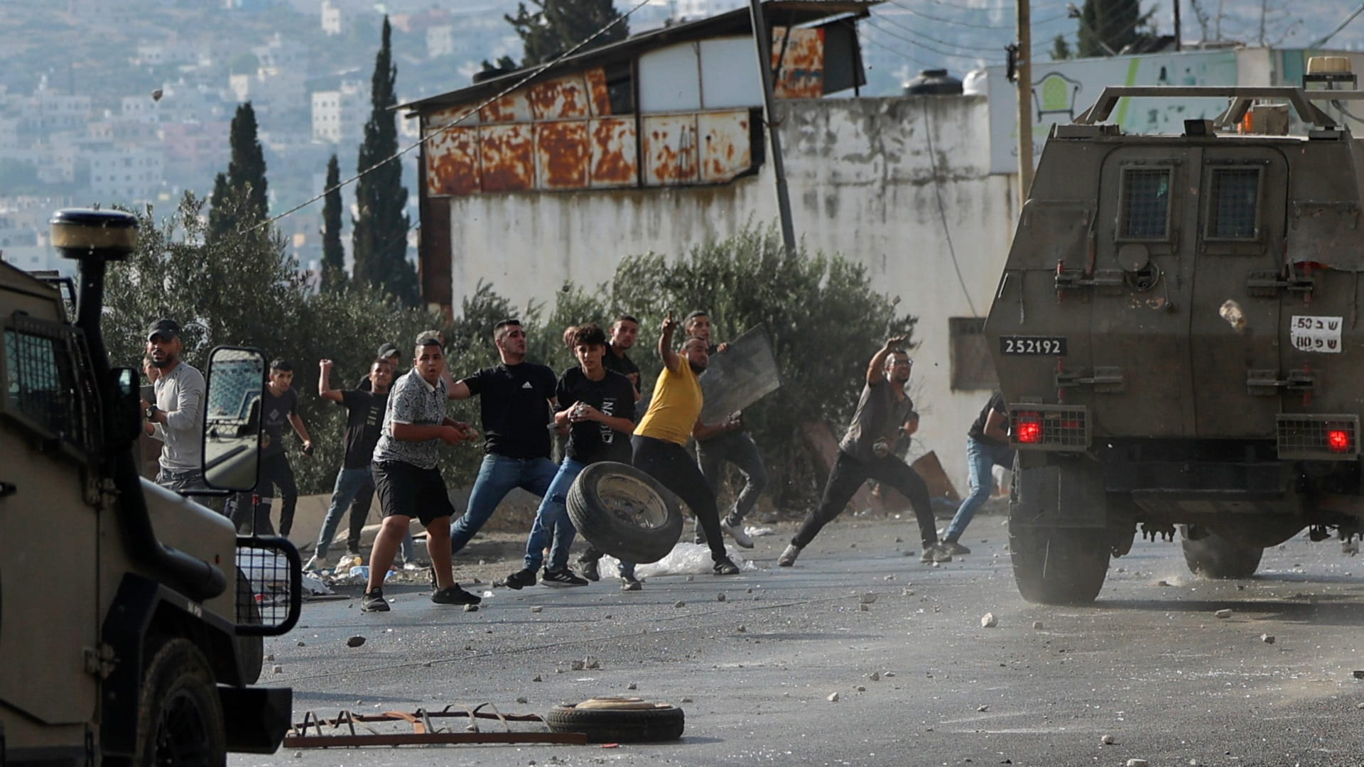 Image for the title: Palestinian killed, dozens injured in clashes with Israeli forces 